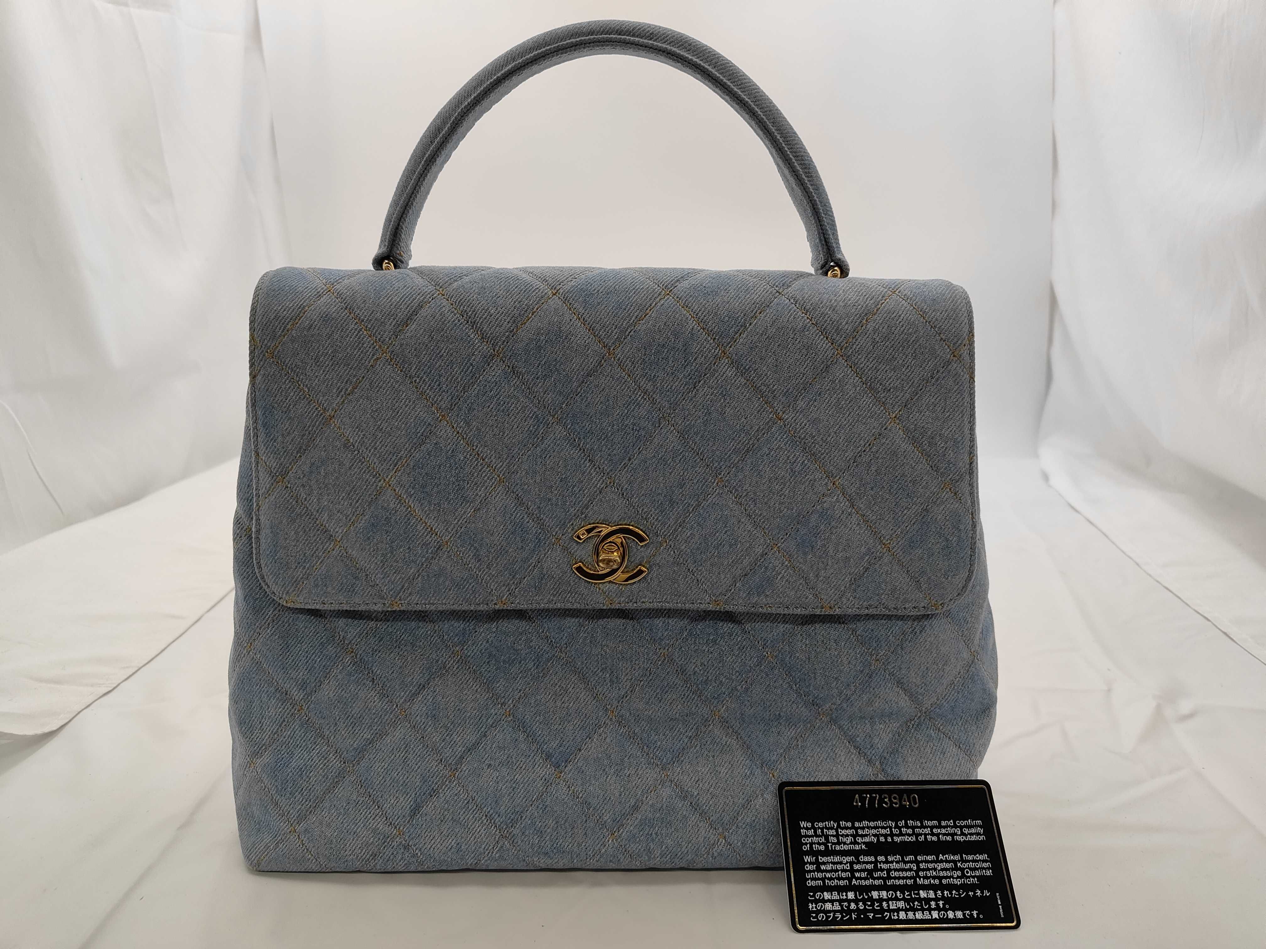 denim Matelassé top handle handbag, light blue denim, G card included.