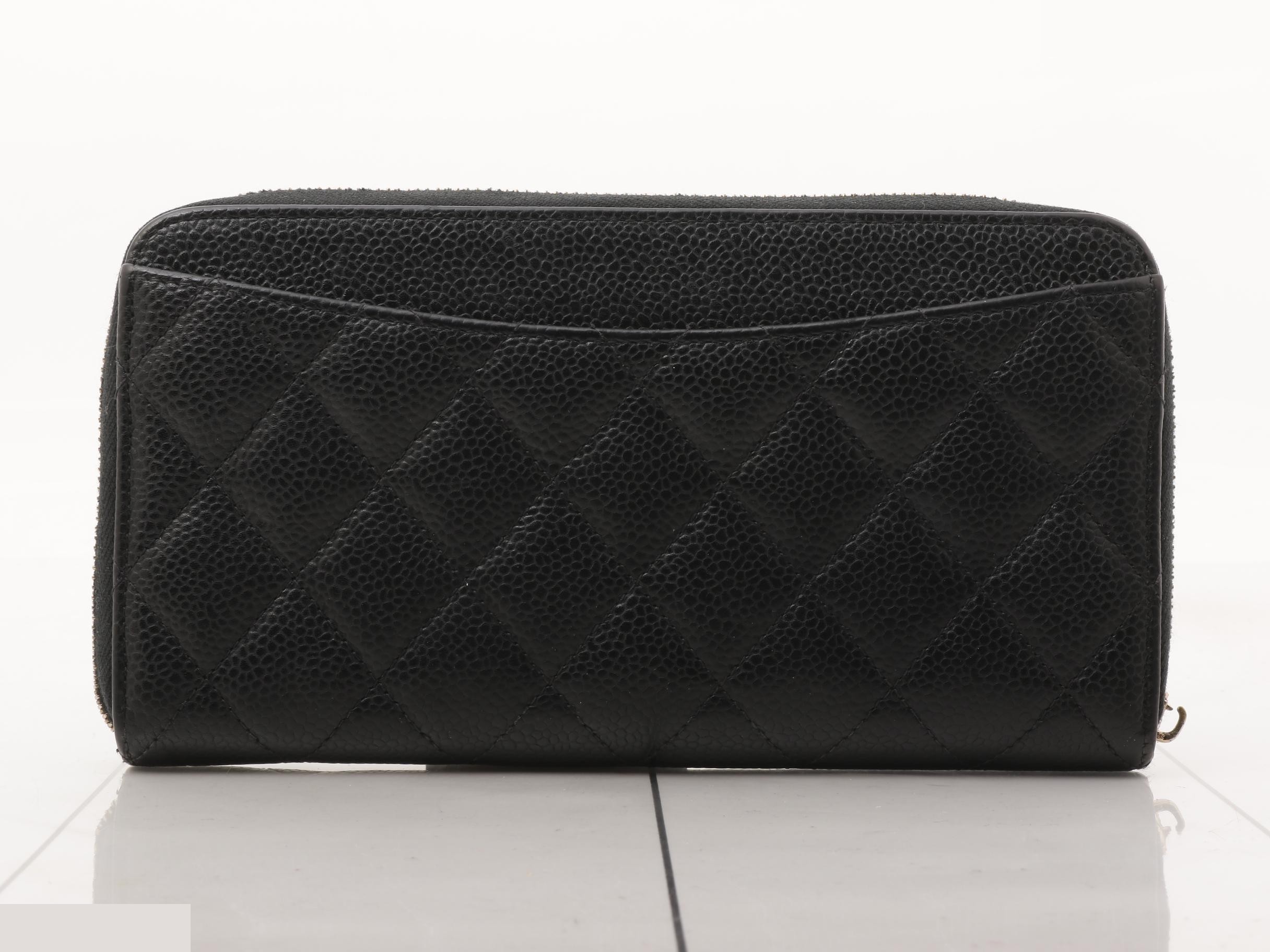 Caviar leather zip-around long wallet, serial number 31, with card and sticker. — view 2