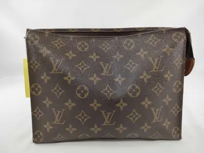 Monogram Pochette Toilette 26