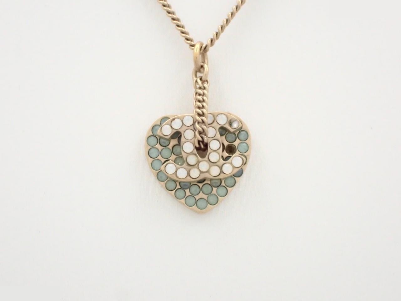 Necklace with Coco Mark/Heart design, chain approximately 44cm long.