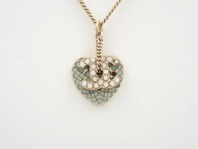 Necklace with Coco Mark/Heart design, chain approximately 44cm long.