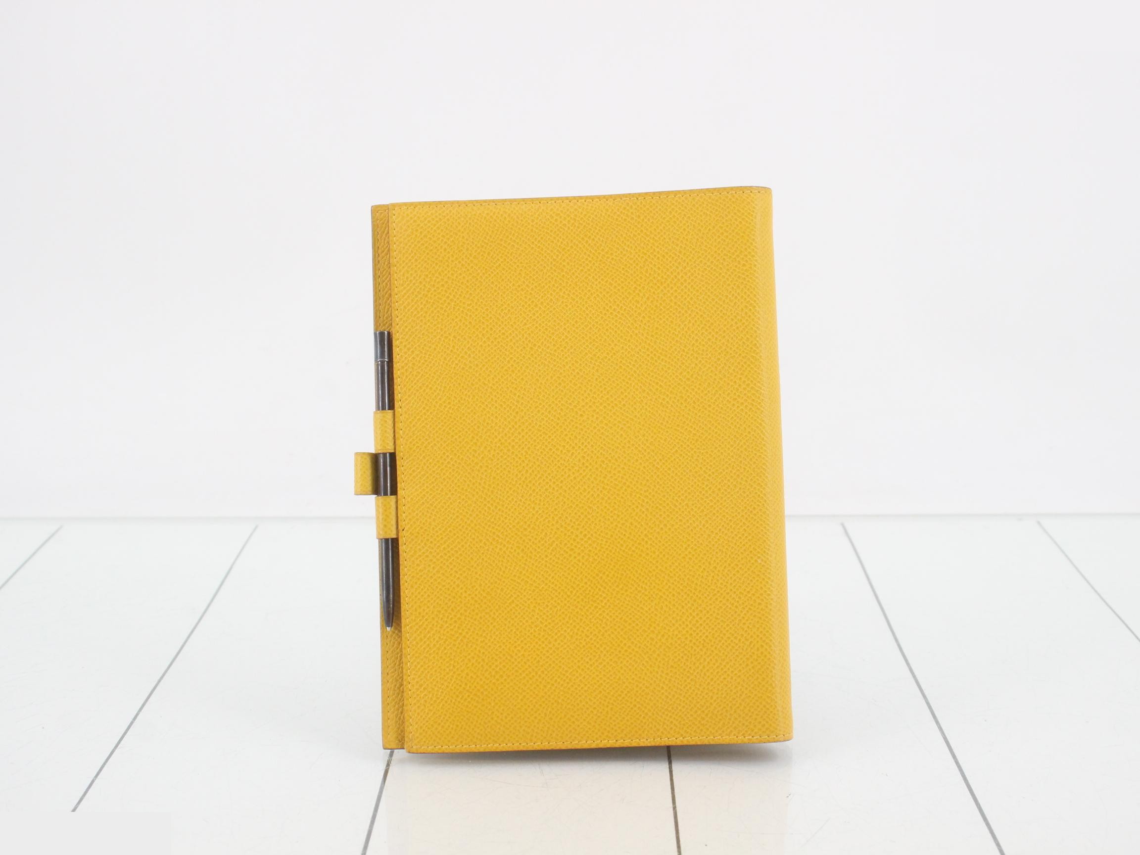 Agenda cover, GM brand, Courchevel leather, yellow, with ballpoint pen, A stamp. — view 2