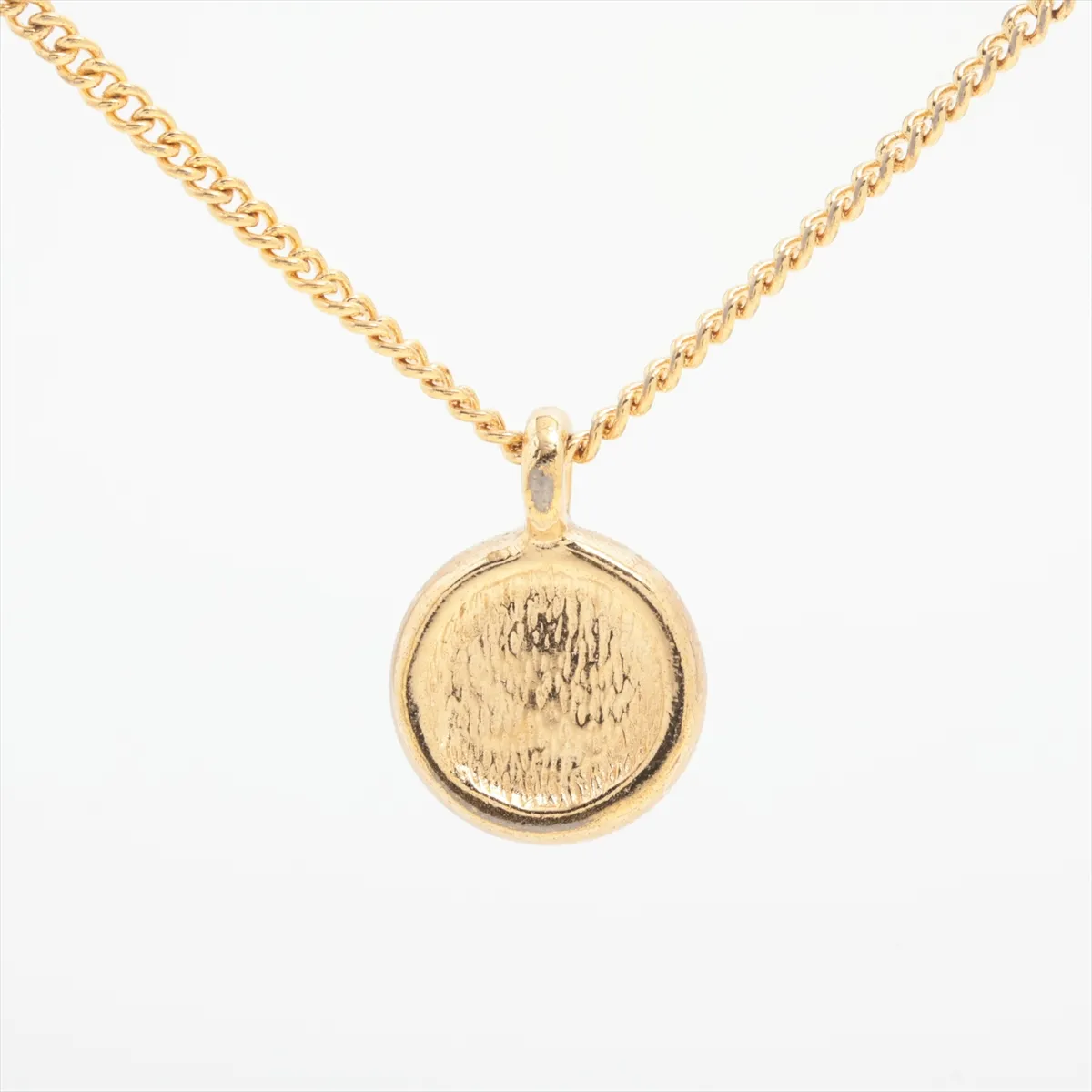 CD logo necklace, gold plated with rhinestones. Shows signs of wear, including — view 2