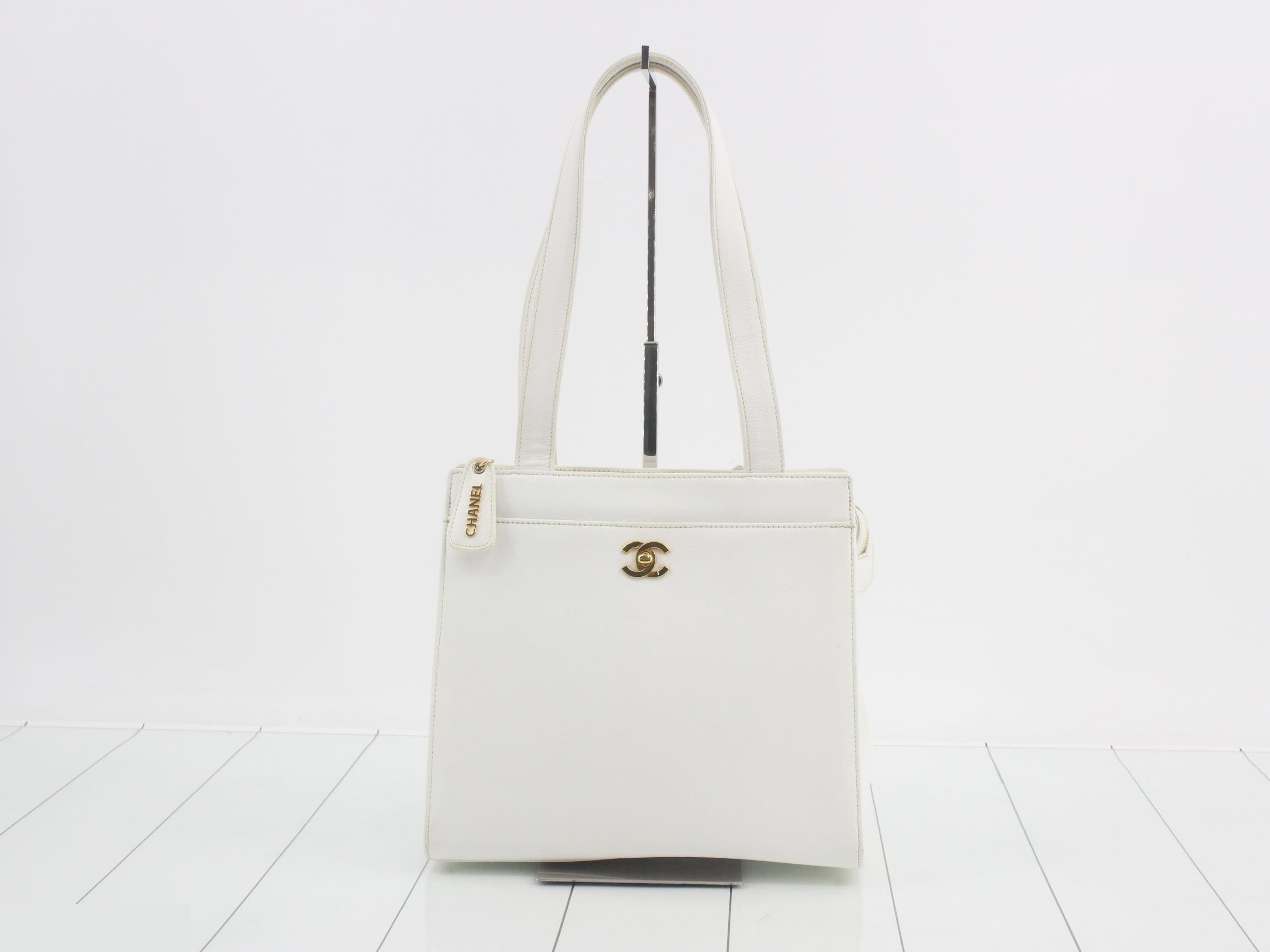 Coco Mark Turnlock Handbag, with sticker, serial number 5, 5245034, White