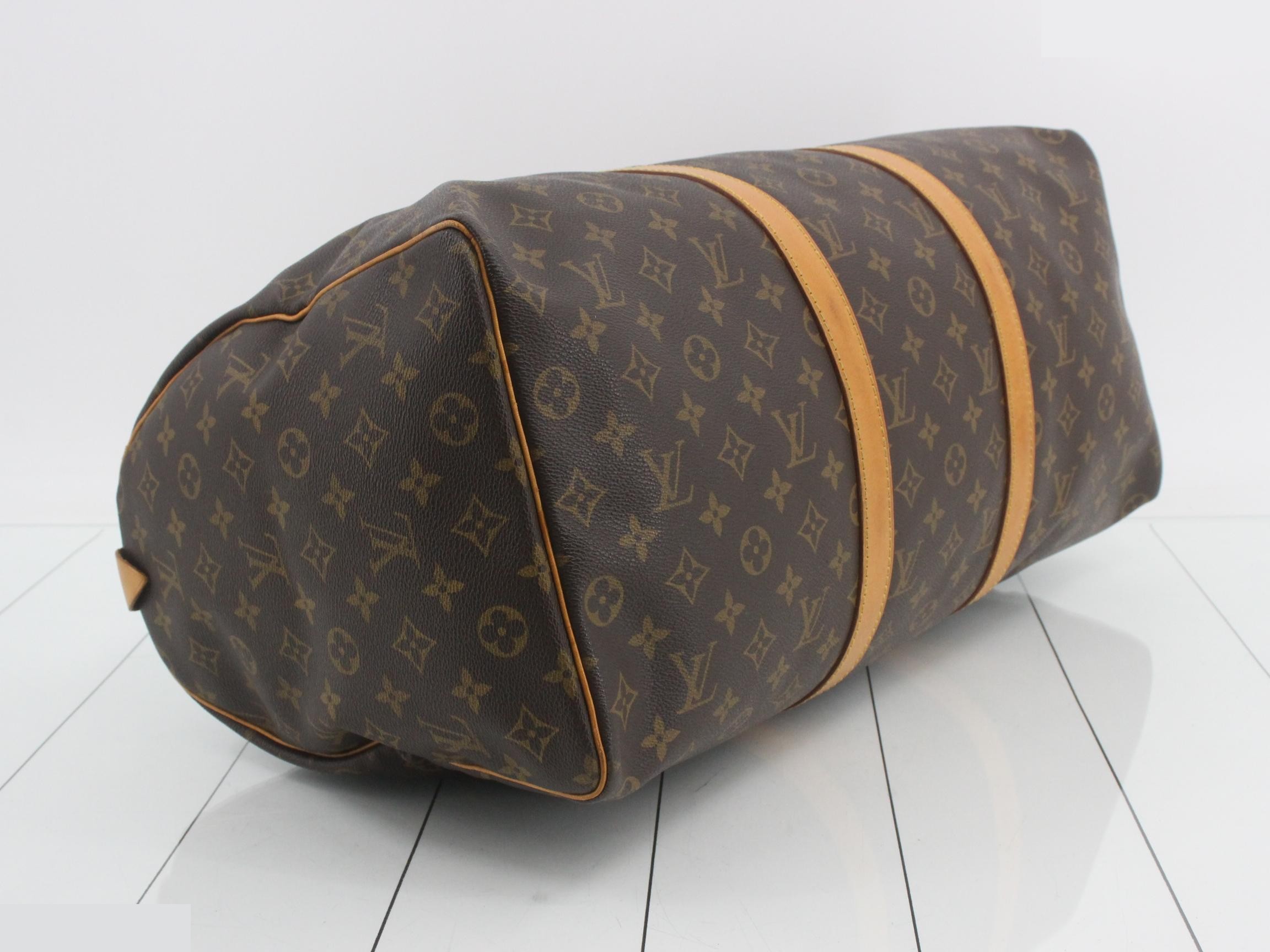 Keepall 50 with padlock, key, name tag, and handle. — view 5