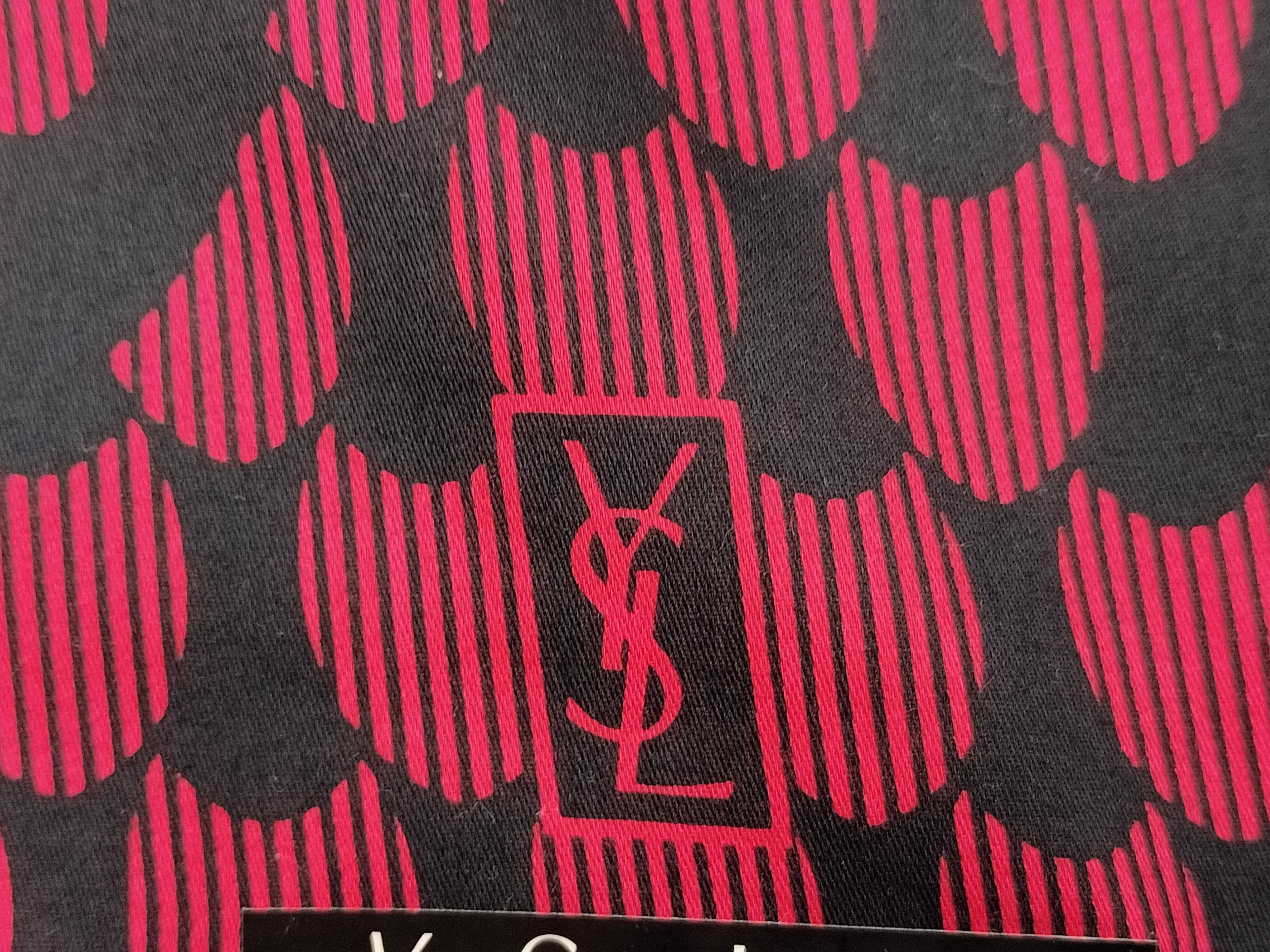 handkerchief scarf with sticker, YSL big logo, and other accessories. — view 4