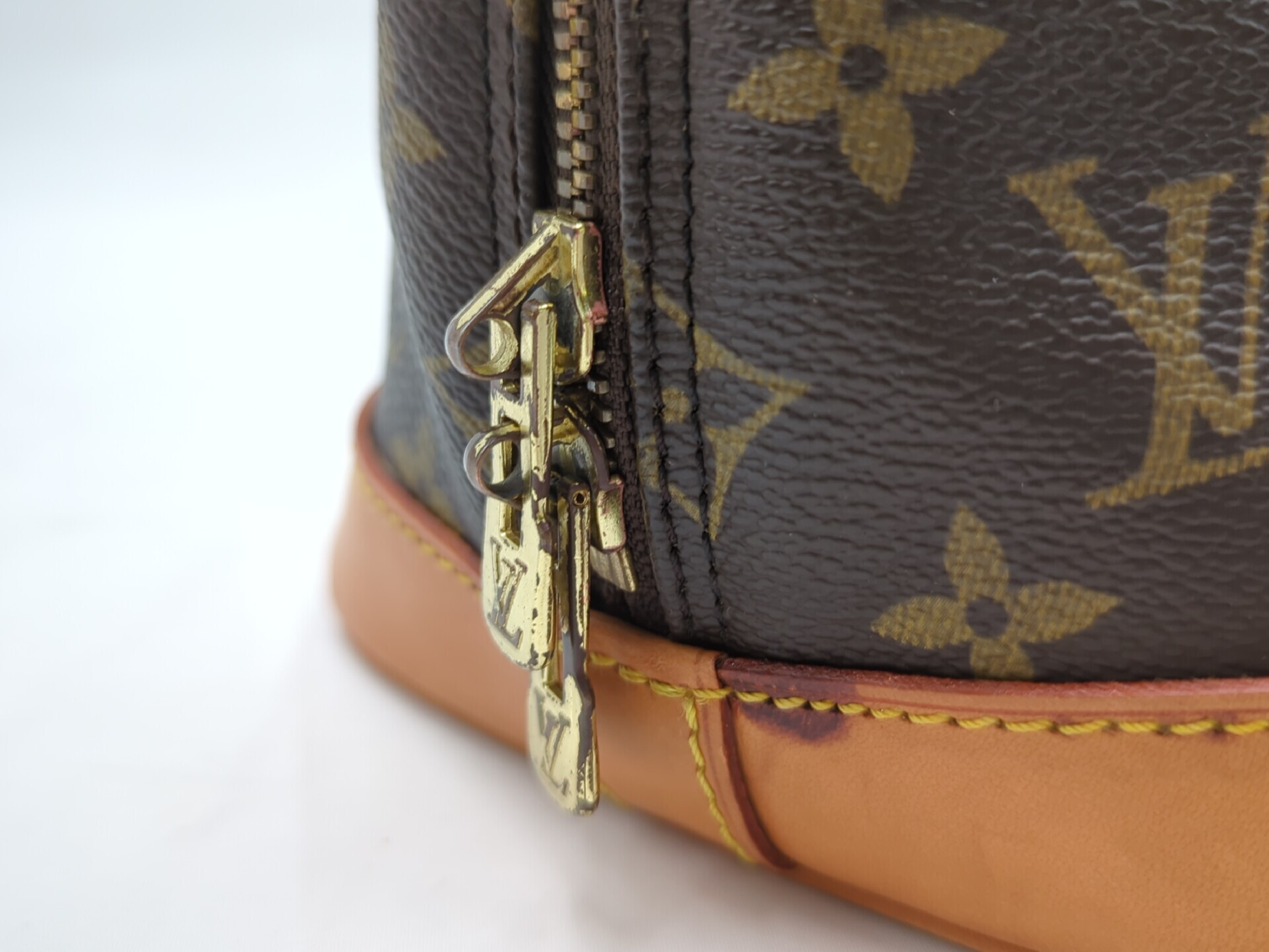 M51130 Monogram Alma Handbag — view 9
