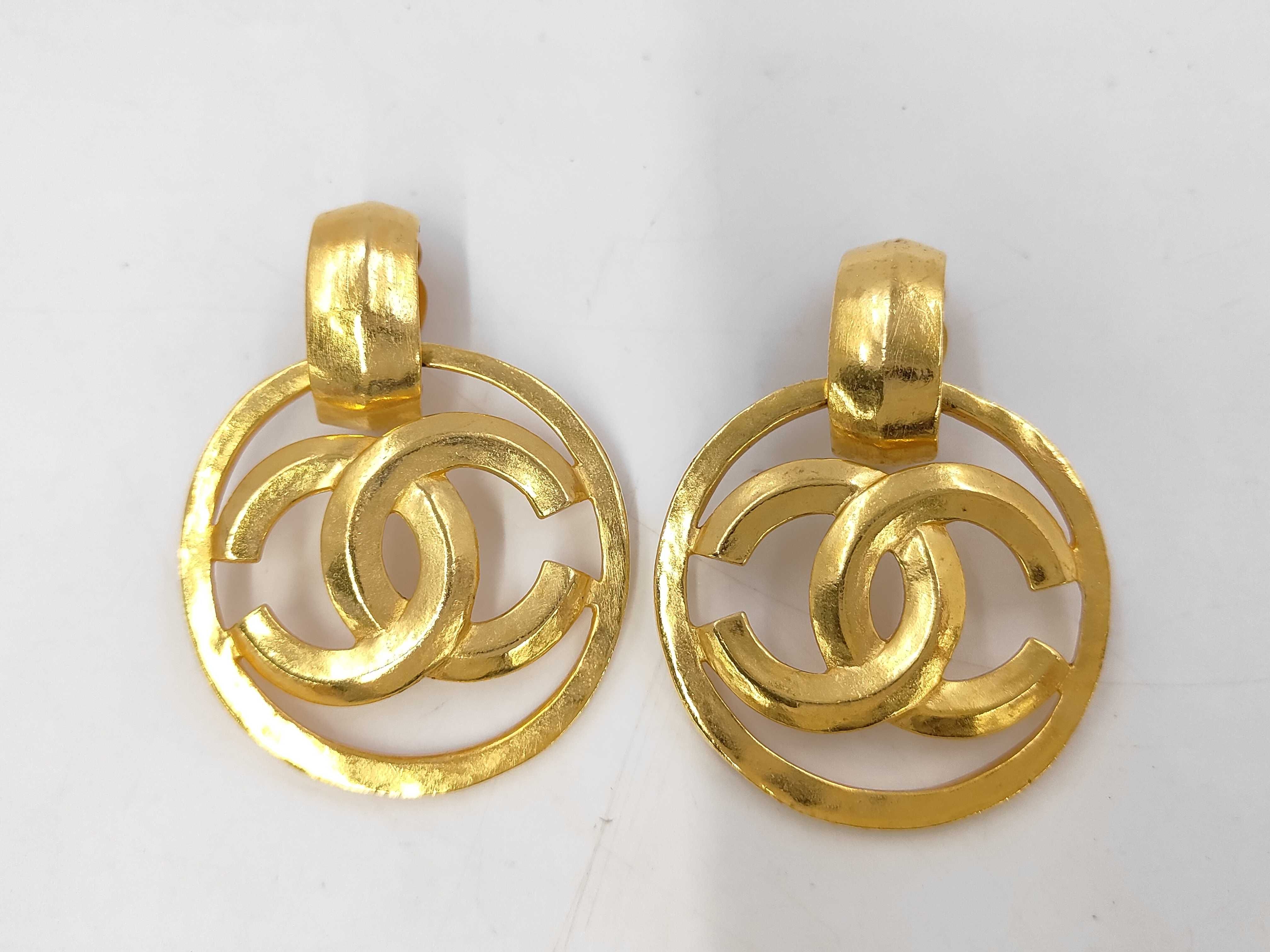 Coco Mark Circle Swing Gold Color Earrings
