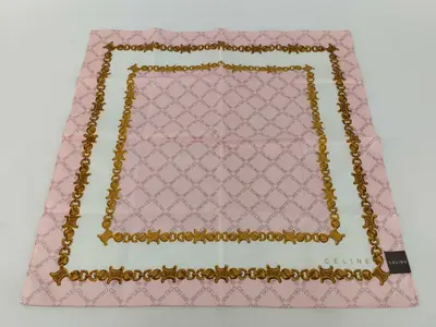 handkerchief scarf with sticker, logo print, macadam chain, pink, and other accessories.