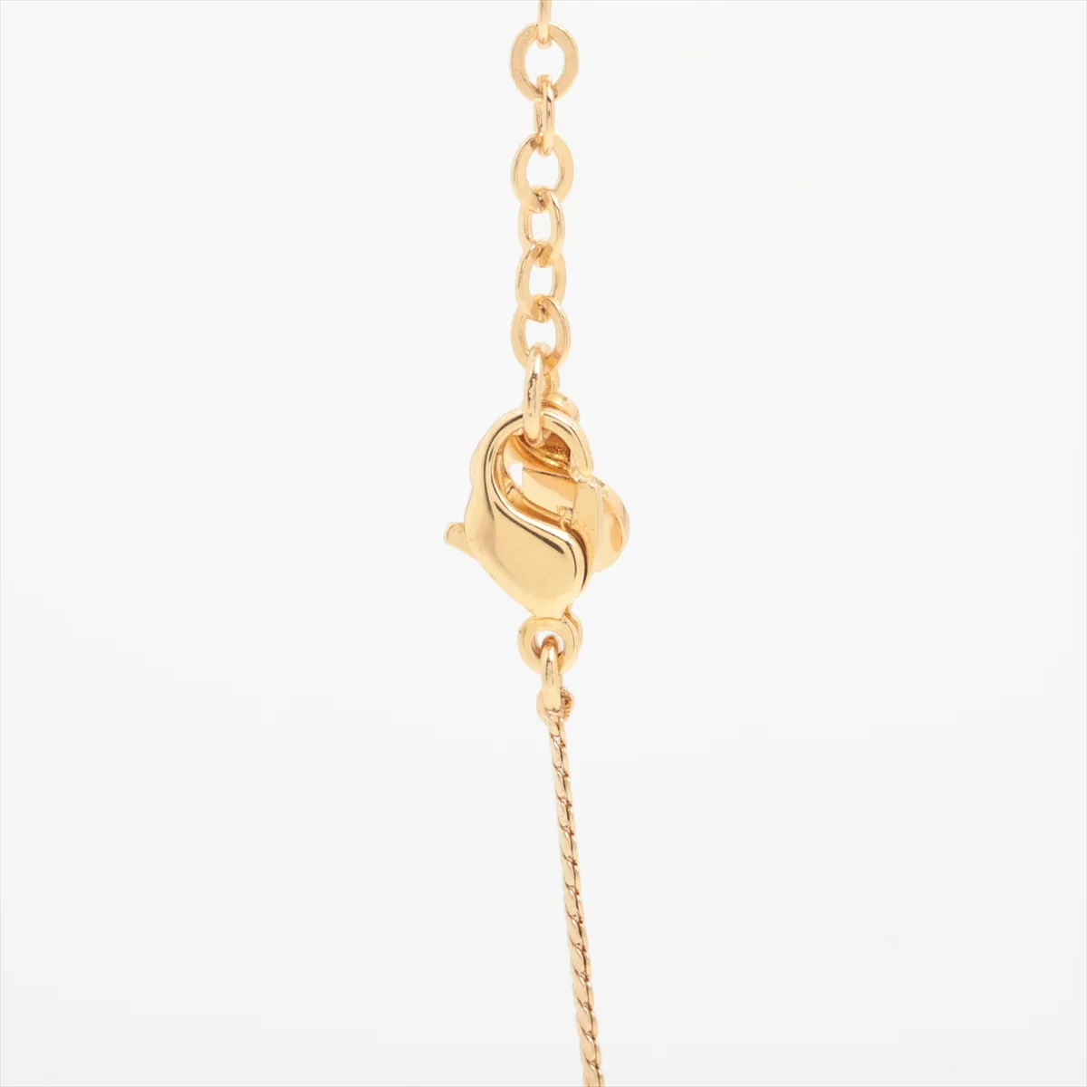 logo necklace, gold plated with rhinestones, shows signs of wear, tarnishing, — view 3