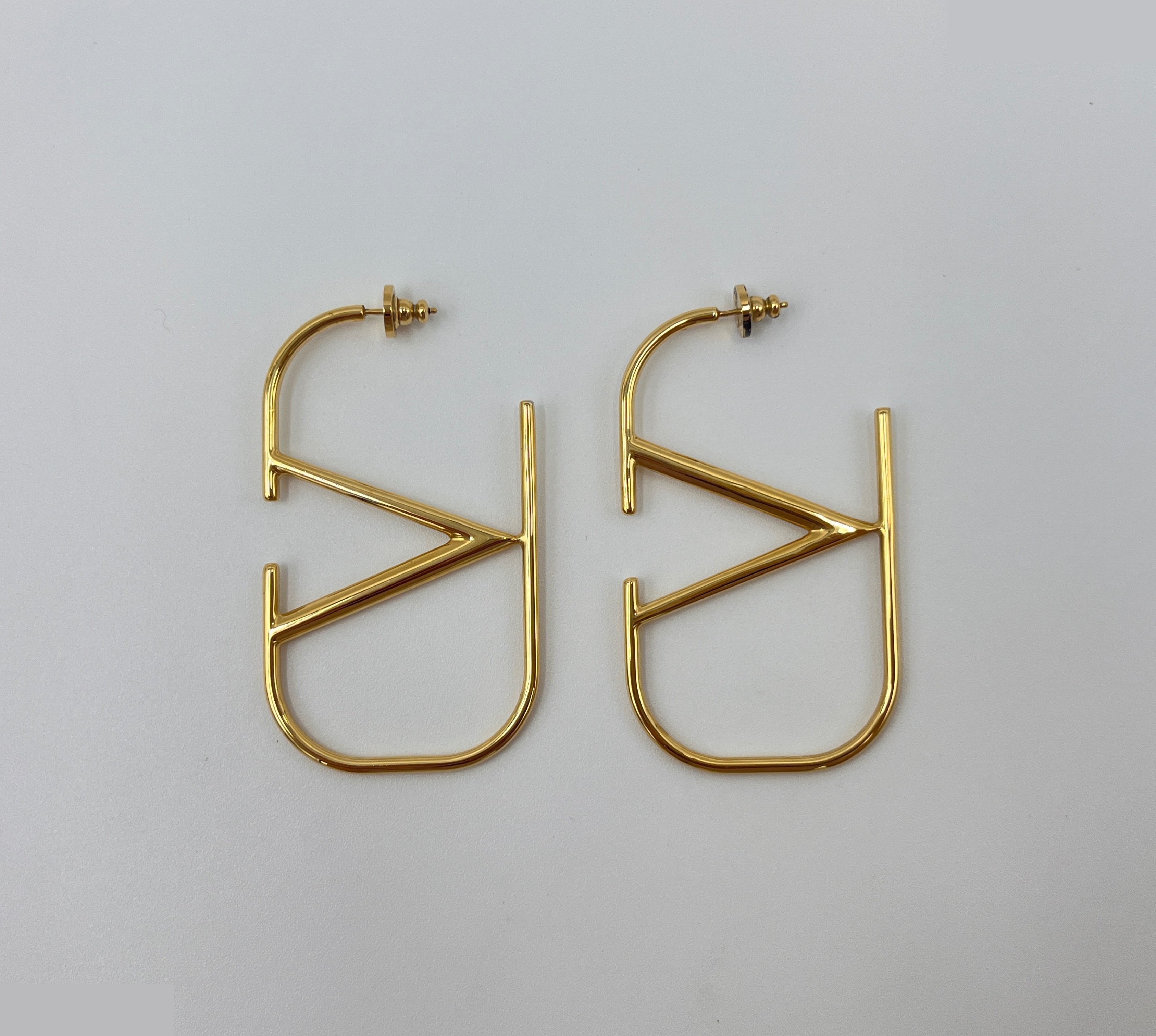 earrings, V logo signature metal earrings