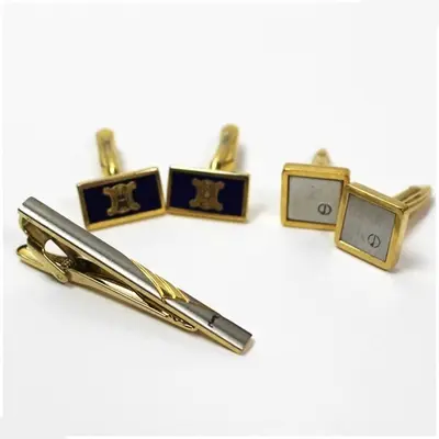 Dunhill, Yves Saint Laurent: 3-piece set including cufflinks and tie clips.