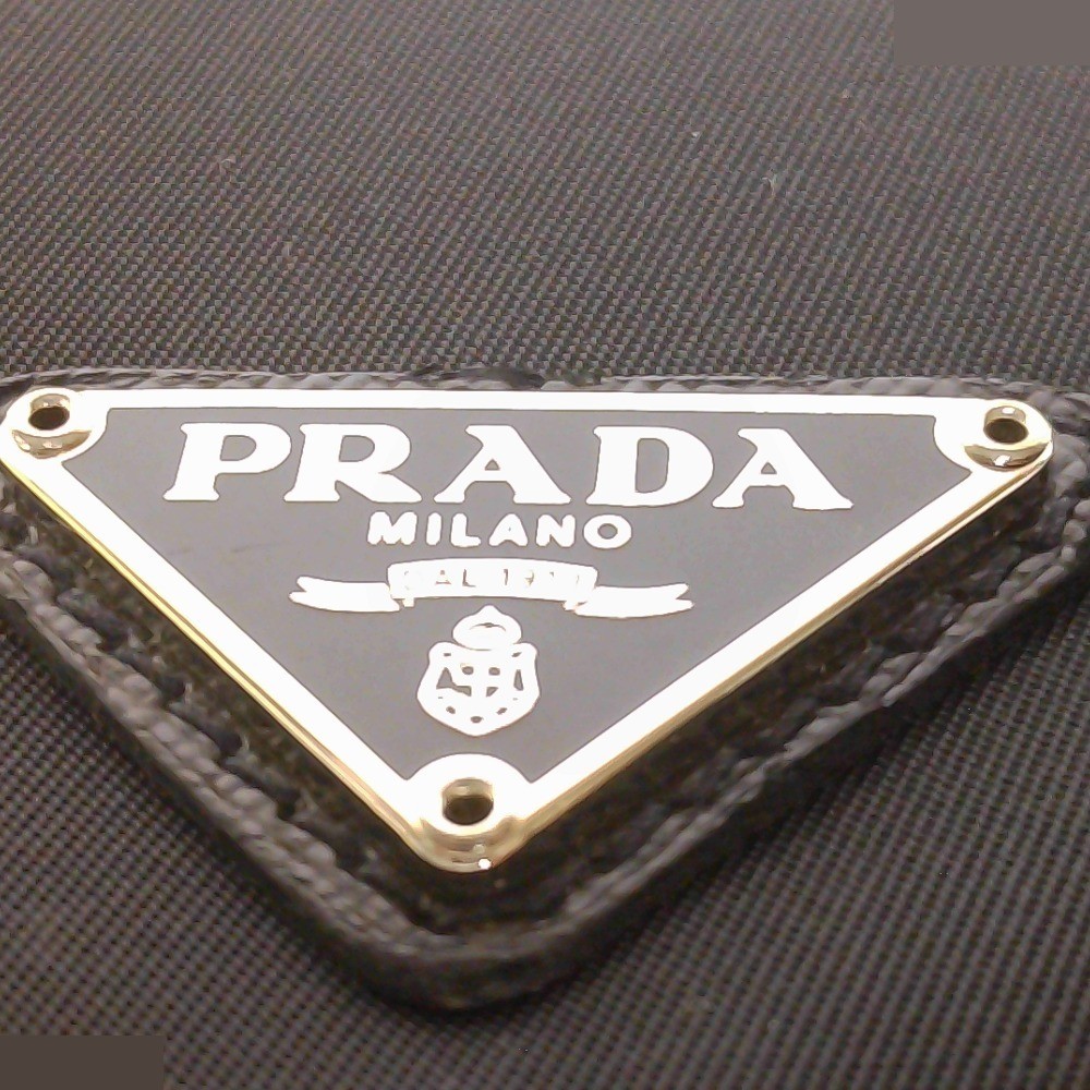 Triangle logo bags and wallets — view 10