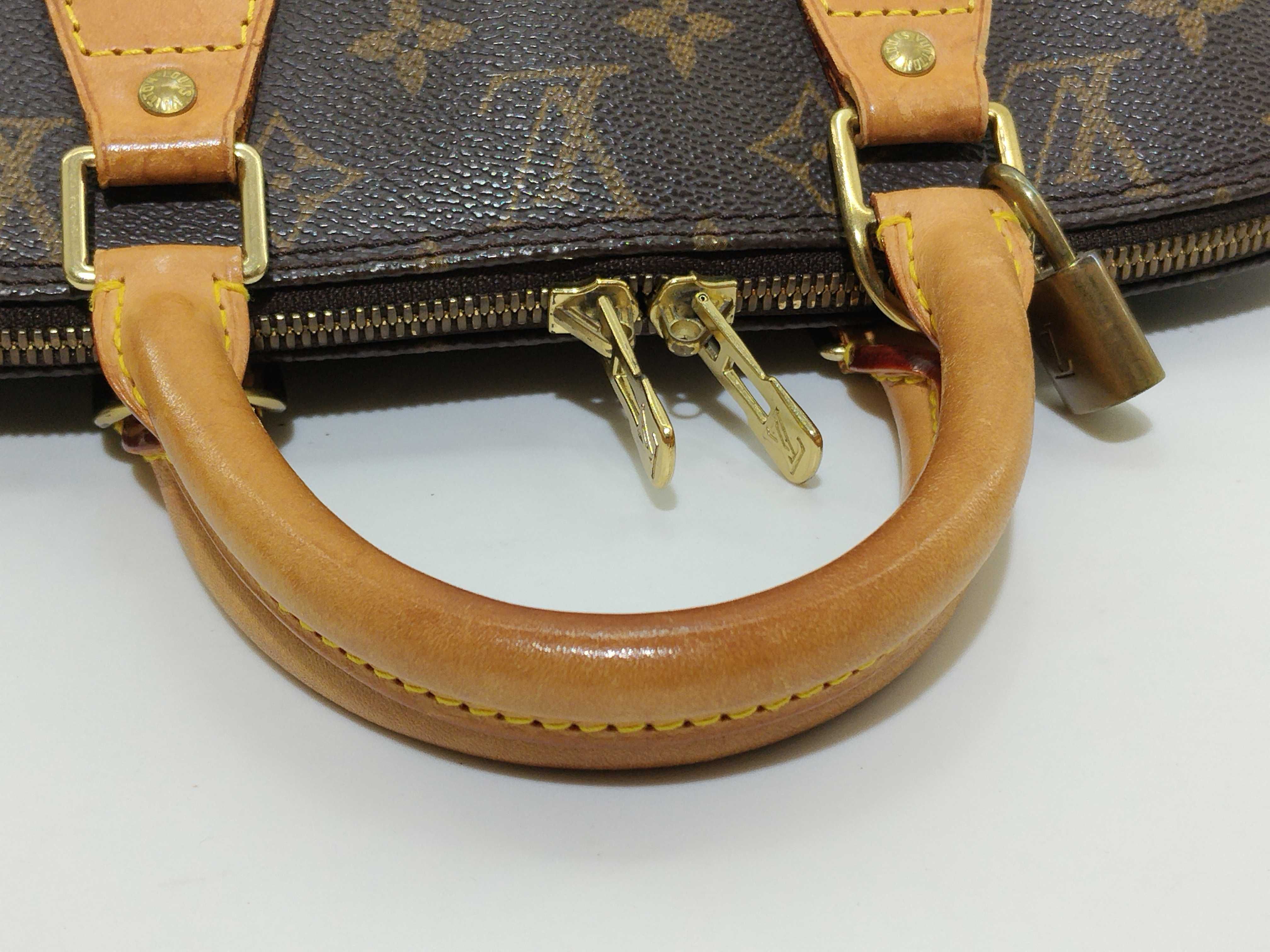 Monogram Alma M51130 VI0969 Brown Handbag — view 7