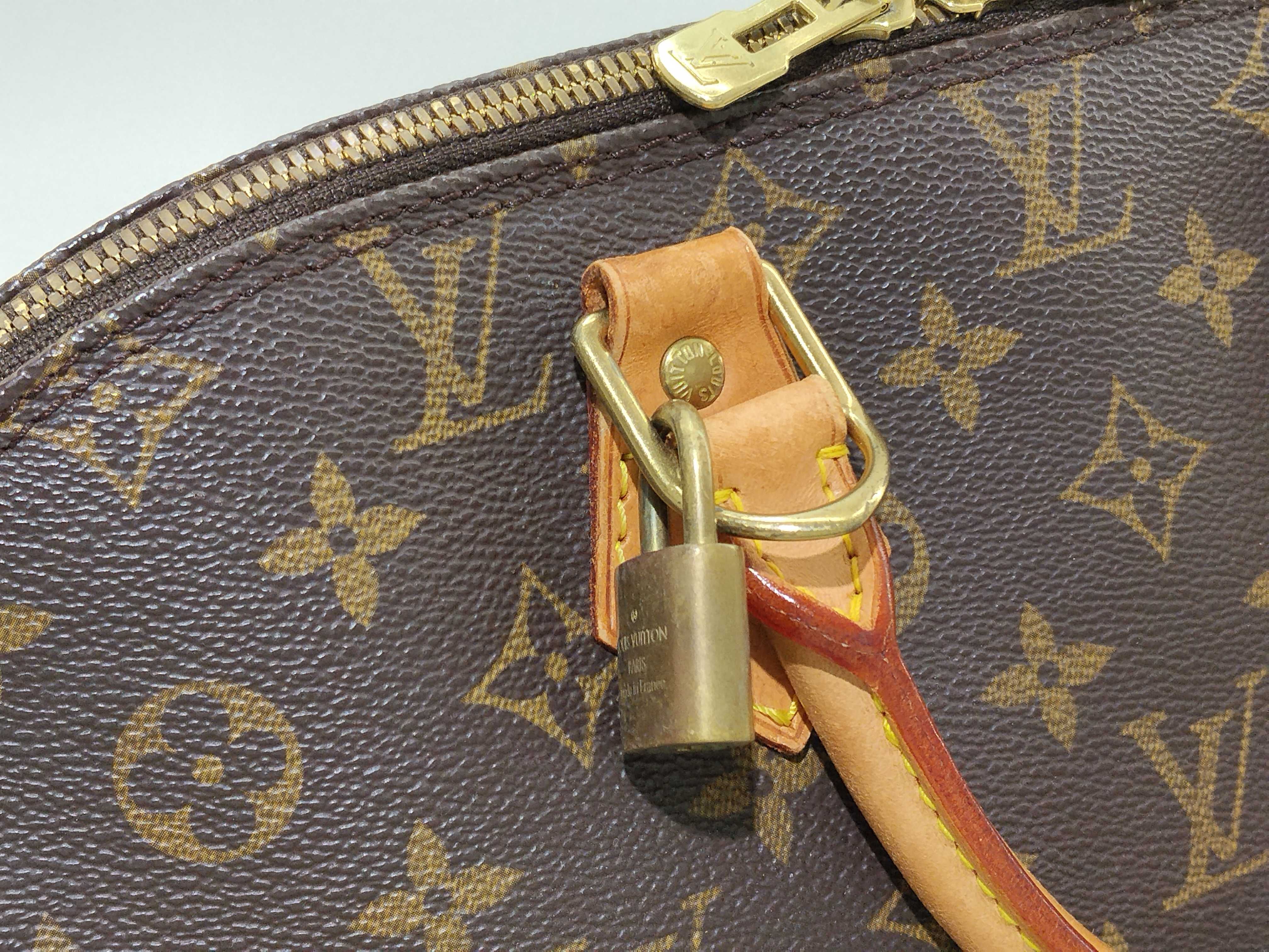 Monogram Alma M51130 VI0969 Brown Handbag — view 8