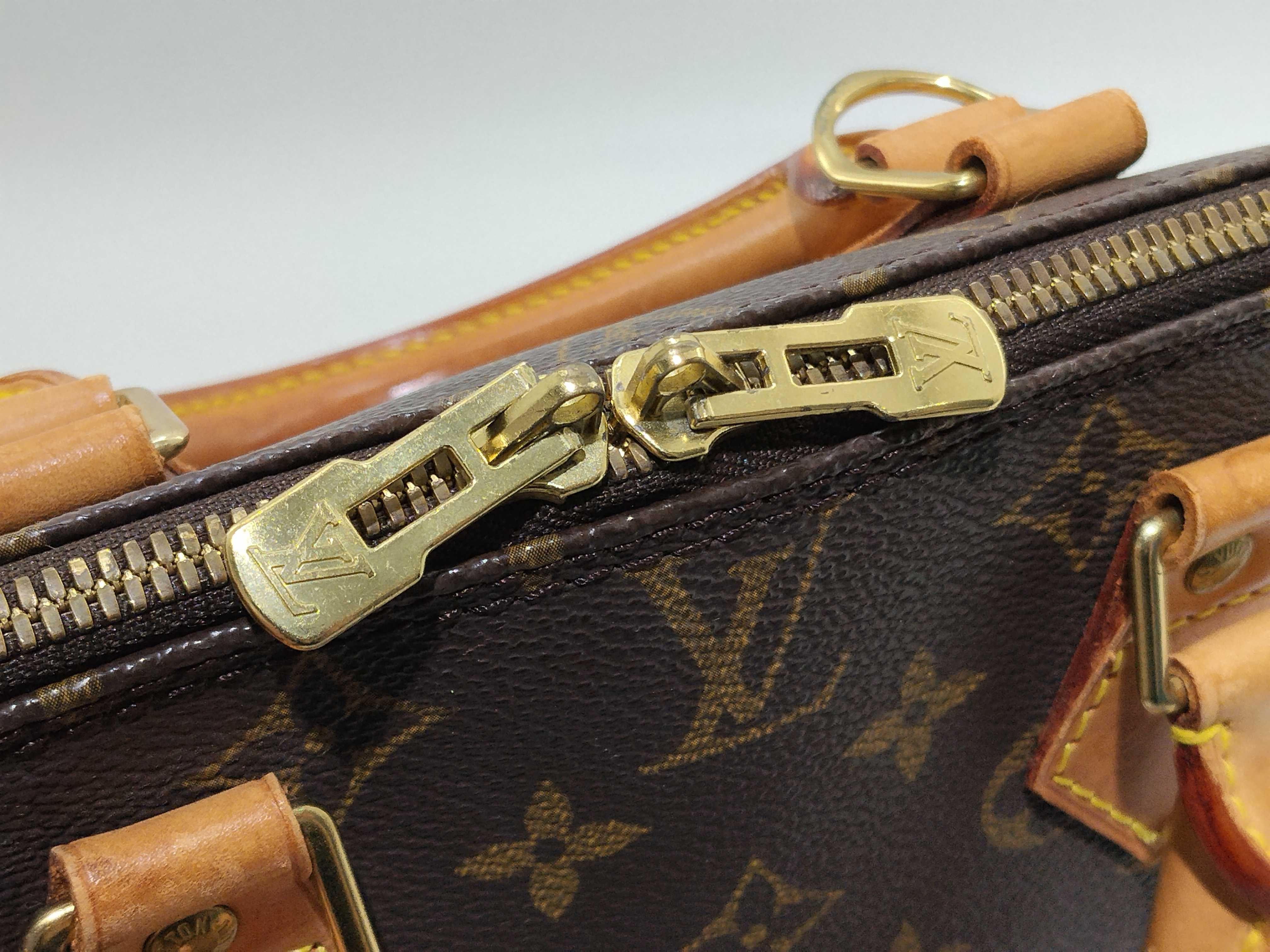 Monogram Alma M51130 VI0969 Brown Handbag — view 10
