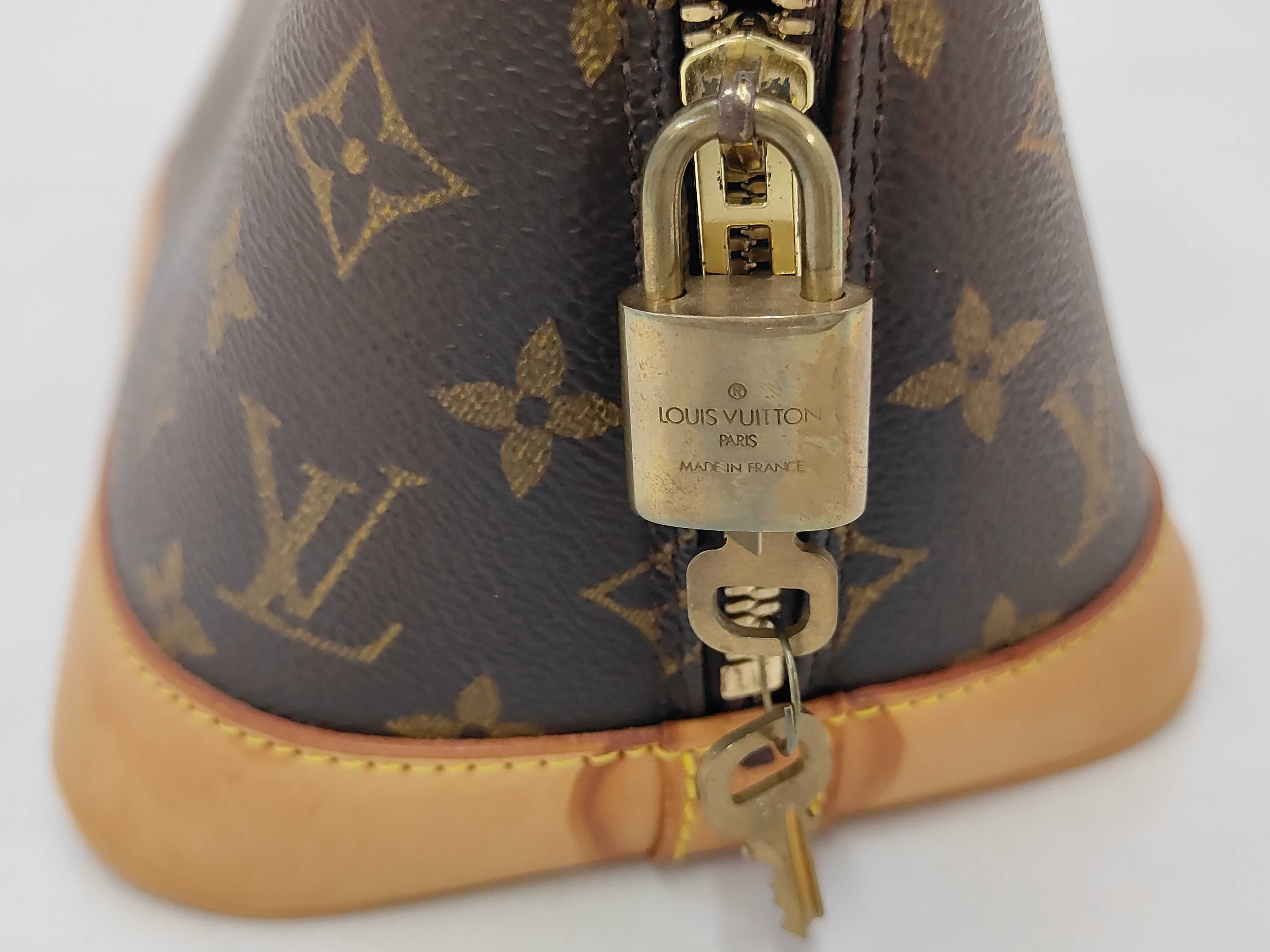 LV Alma M51130 Monogram Handbag — view 8