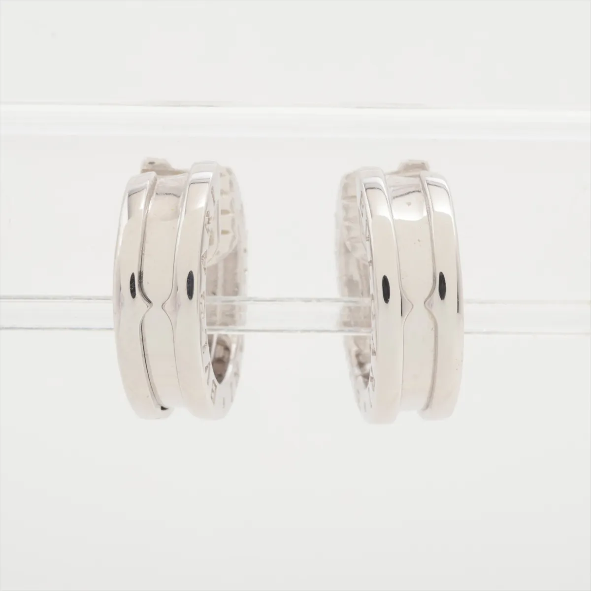 B.zero1 earrings, 750 (WG), 8.2g. Post is bent, soldering is poor, one earring has a loose lock. — view 2