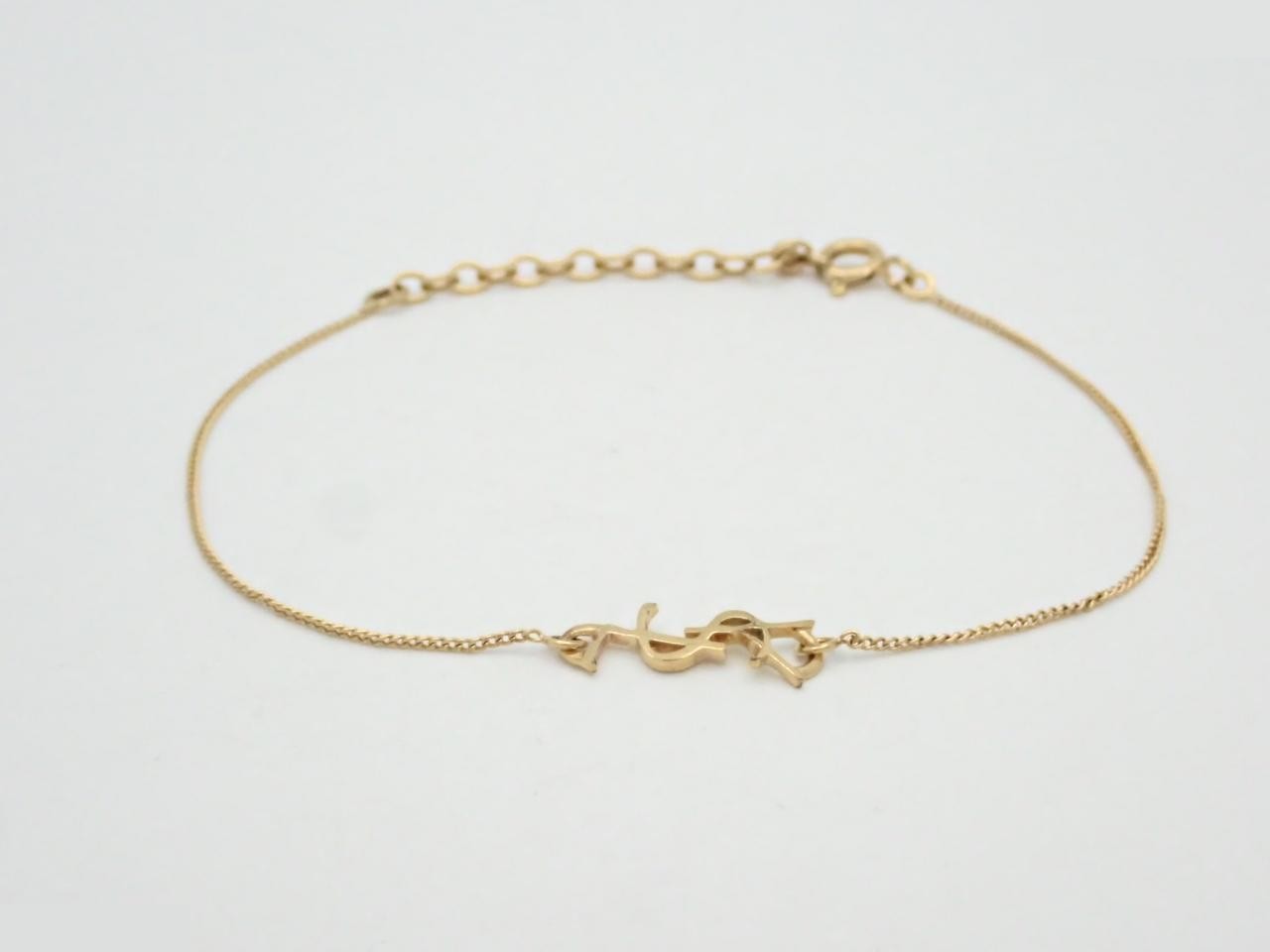 logo bracelet, GP (gold plated), wrist circumference approximately 21.5 cm.