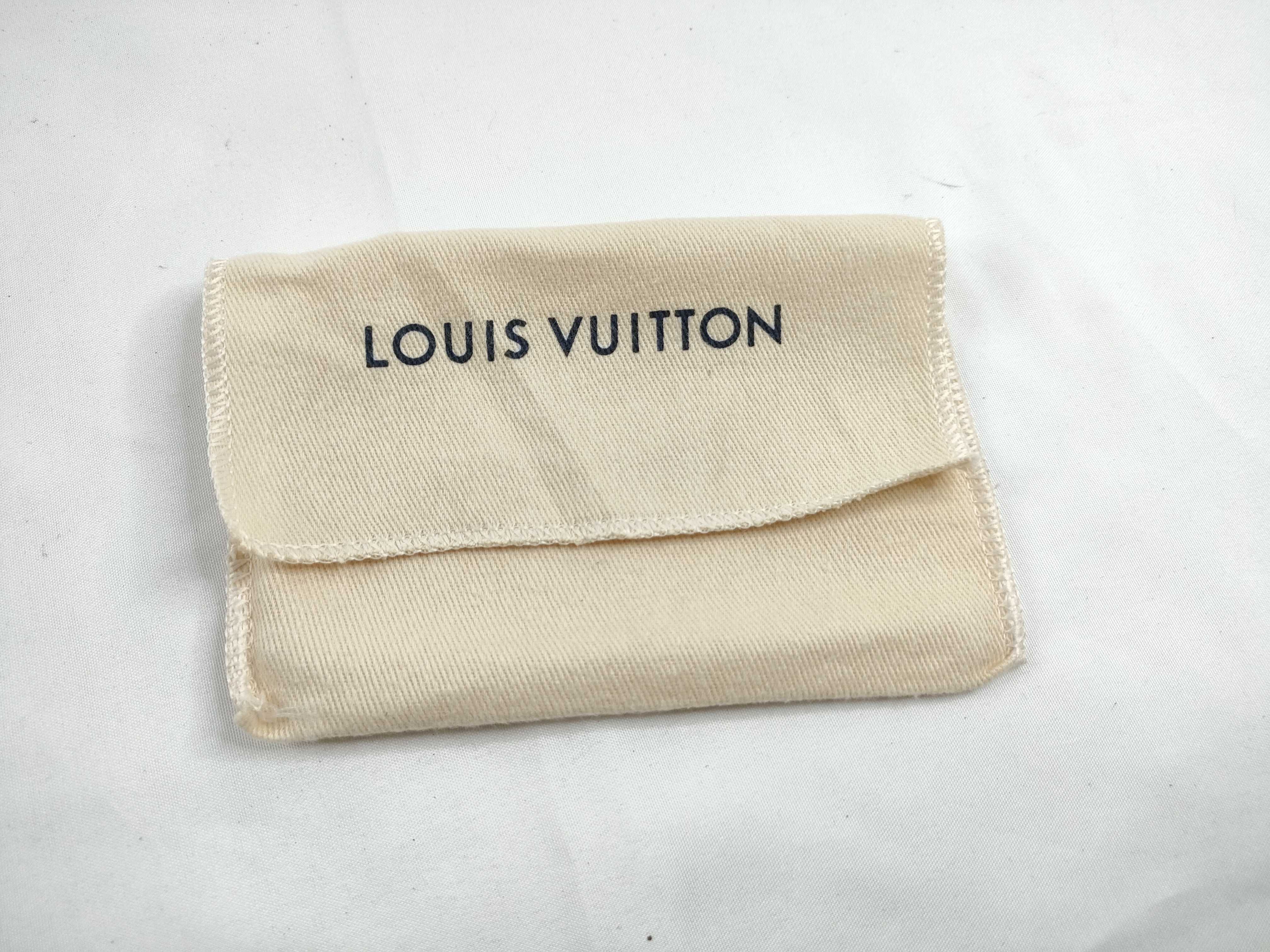Name Tag (Red), Dust Bag, and Other Accessories — view 9