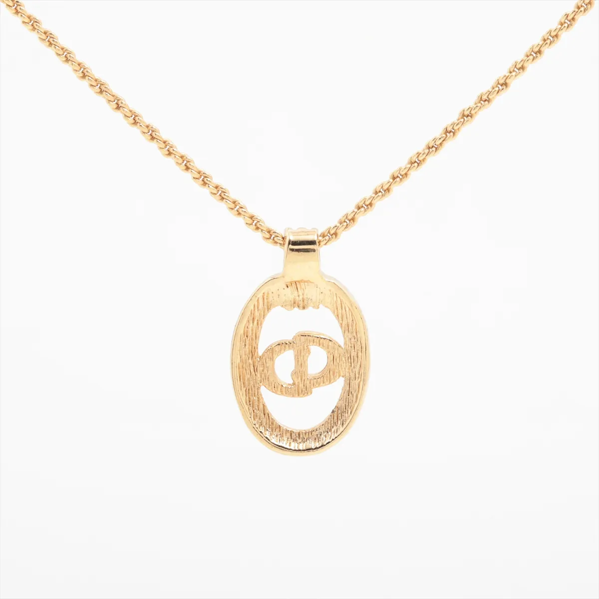 CD logo necklace, gold plated with rhinestones. Shows signs of wear, — view 2