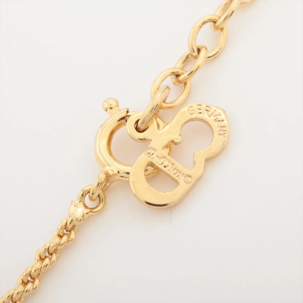 CD logo necklace, gold plated with rhinestones. Shows signs of wear, — view 4