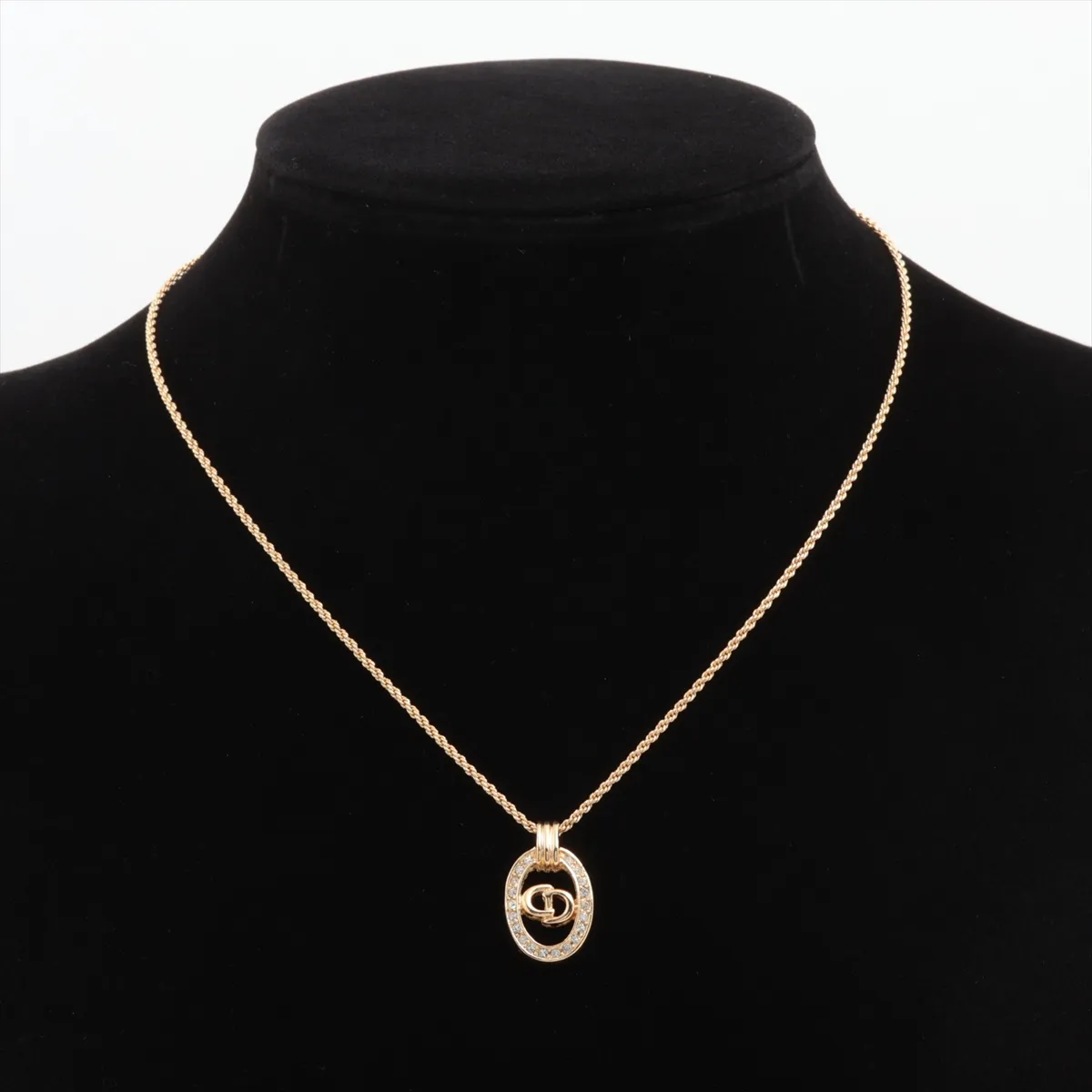 CD logo necklace, gold plated with rhinestones. Shows signs of wear, — view 5