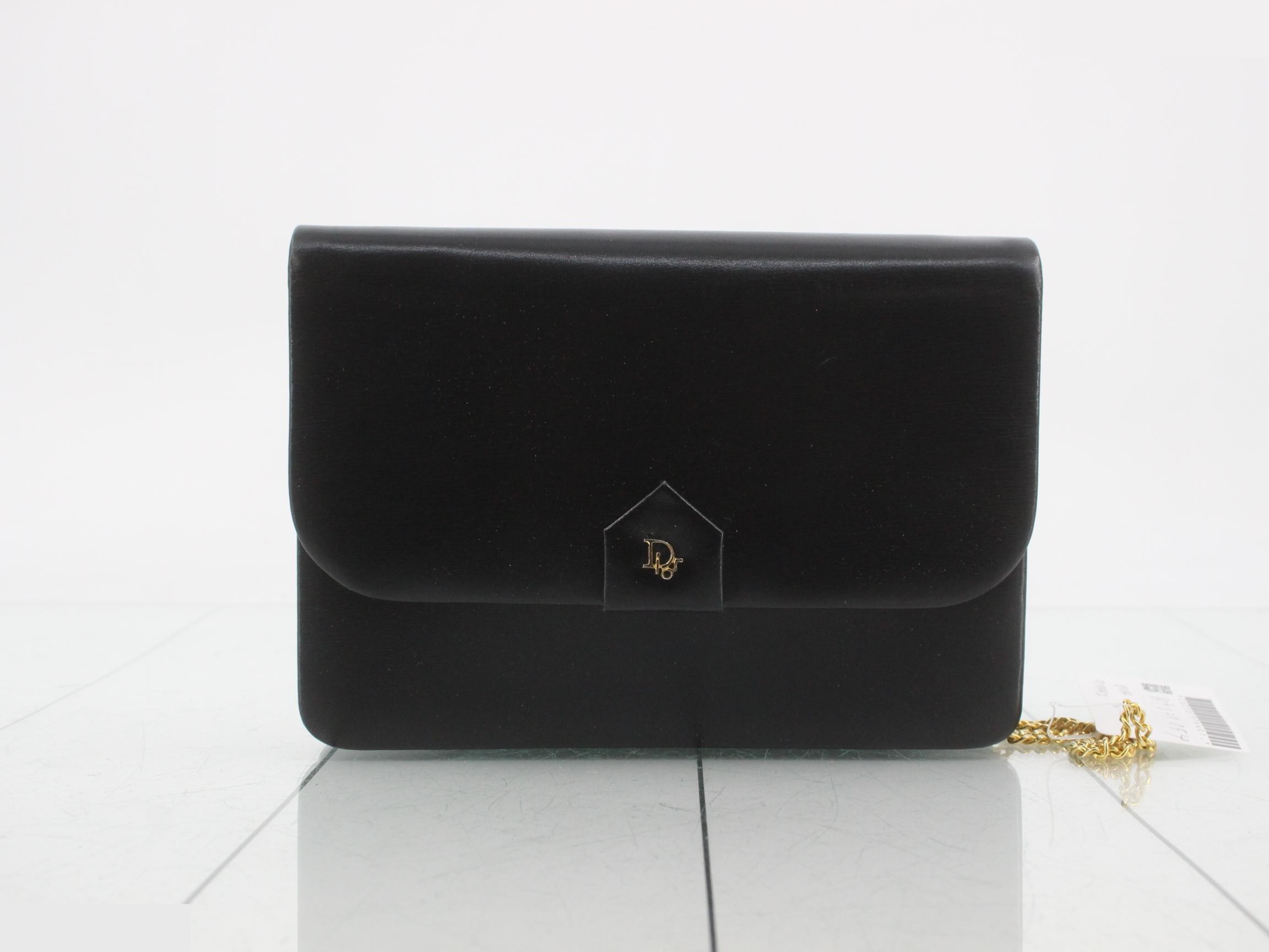 Leather chain shoulder bag with dust bag.