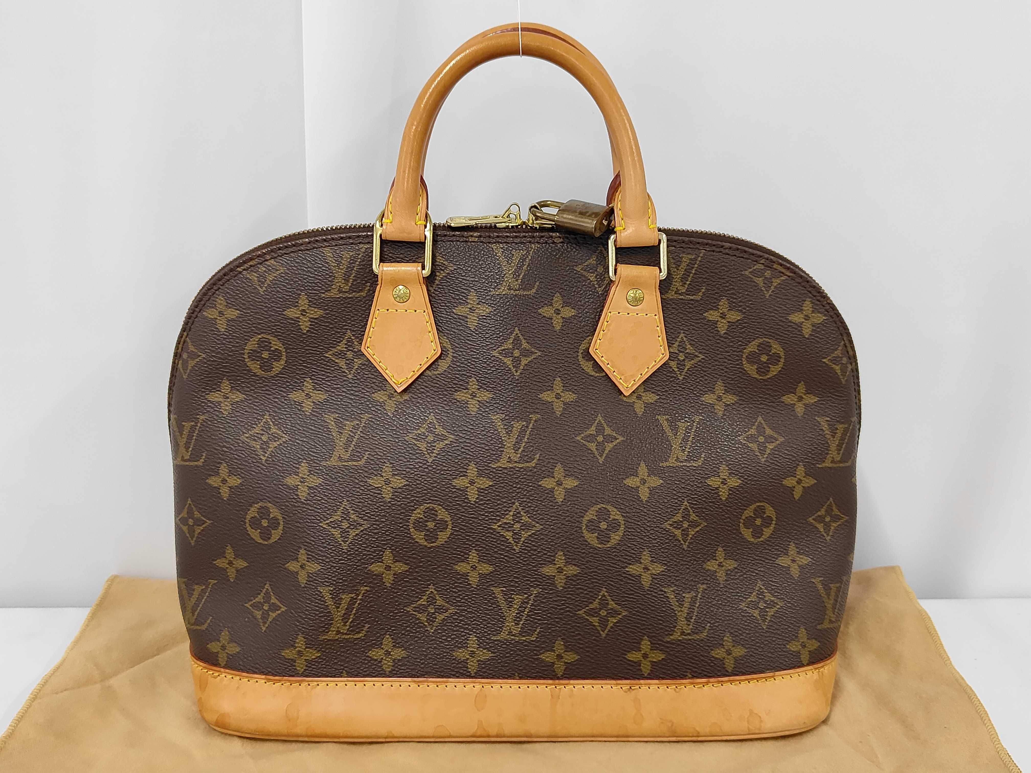 Alma Handbag Monogram M51130 Handbag