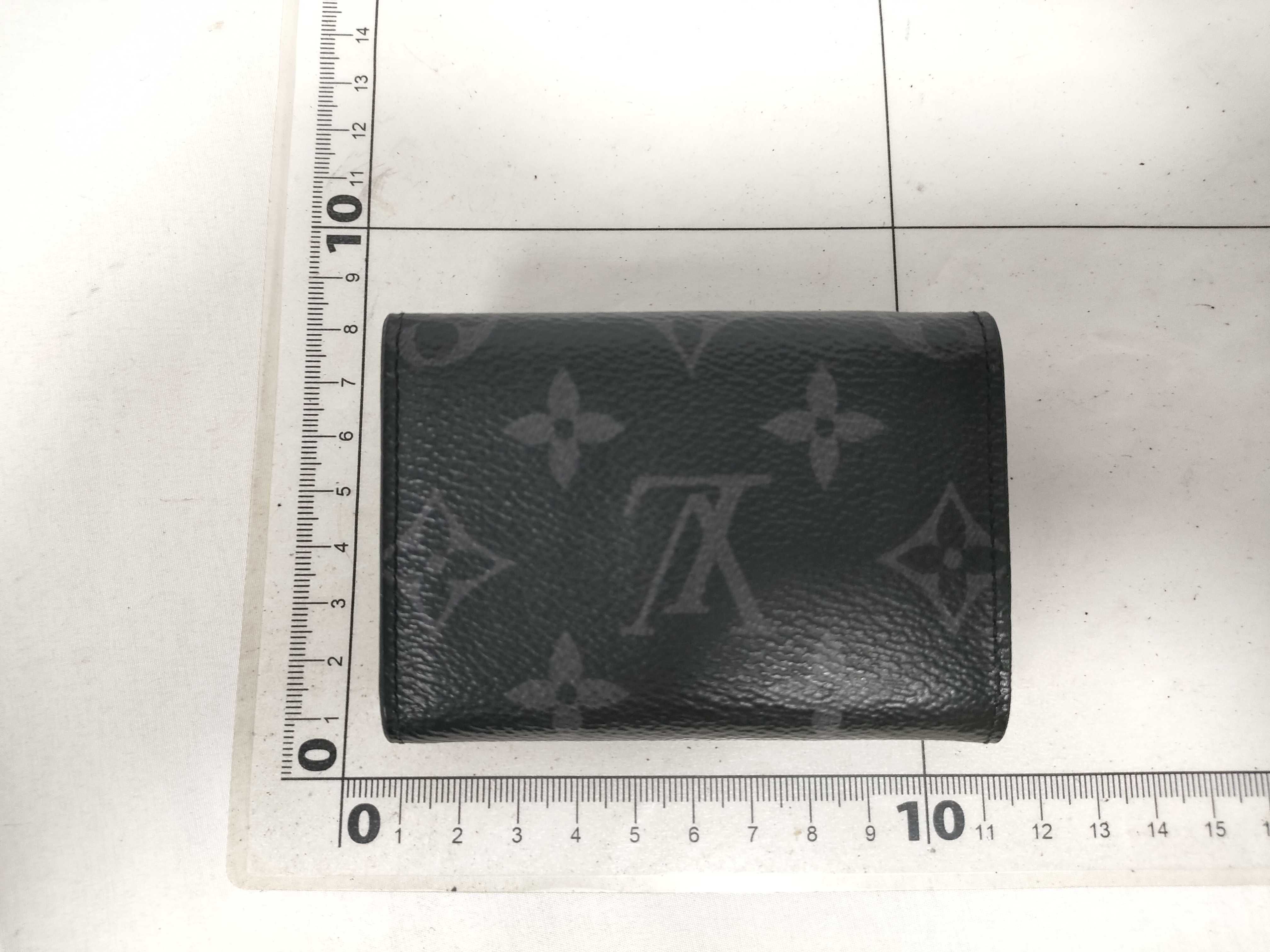 Monogram Eclipse Discovery Compact Wallet M67630 (RFID enabled, snap closure in good condition) — view 2