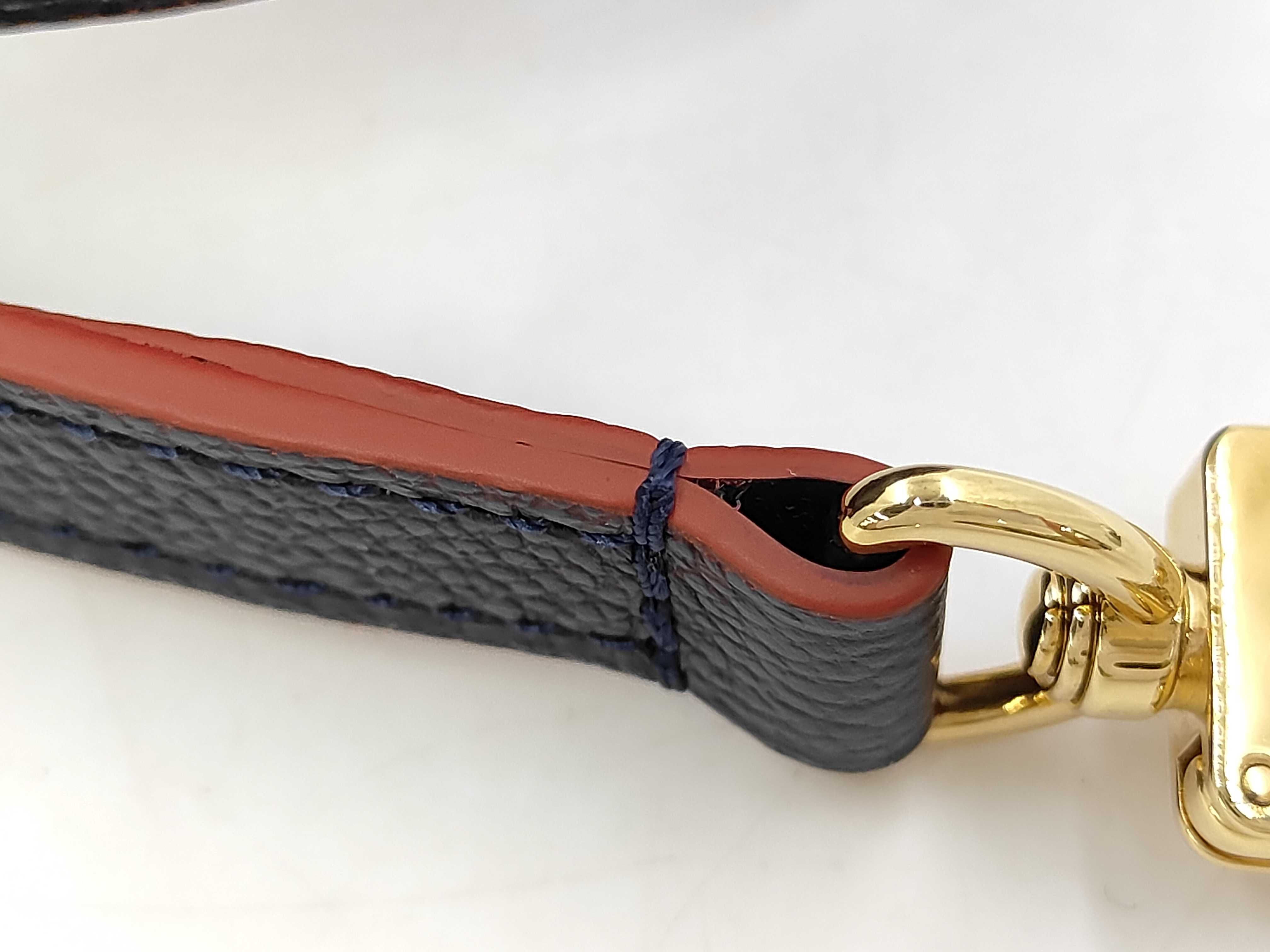 Ponche Monogram Empreinte Handbag — view 12