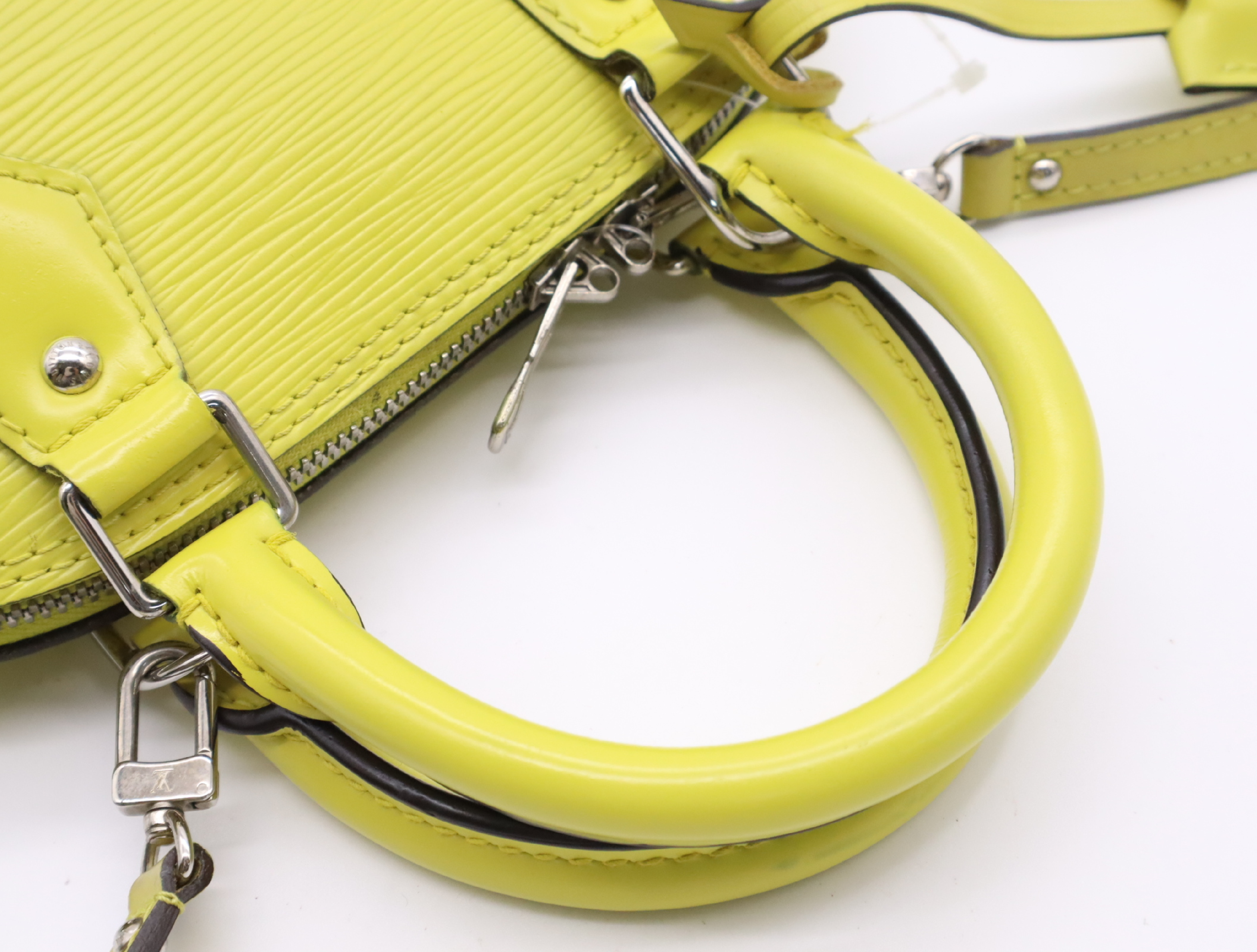 M40981 Epi Alma BB Pistache Handbag with Clochette, 2 Keys, and Shoulder Strap — view 11