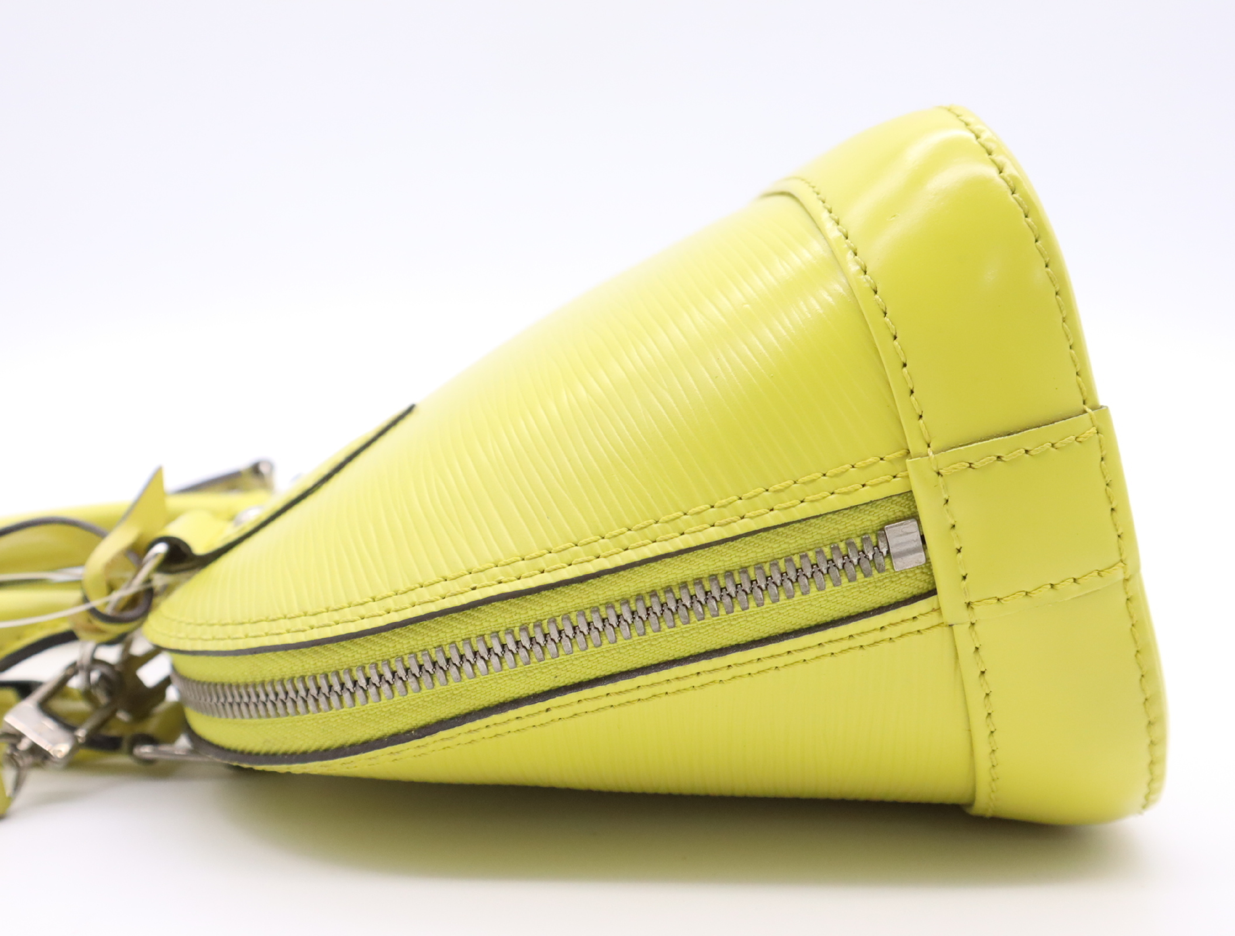 M40981 Epi Alma BB Pistache Handbag with Clochette, 2 Keys, and Shoulder Strap — view 3