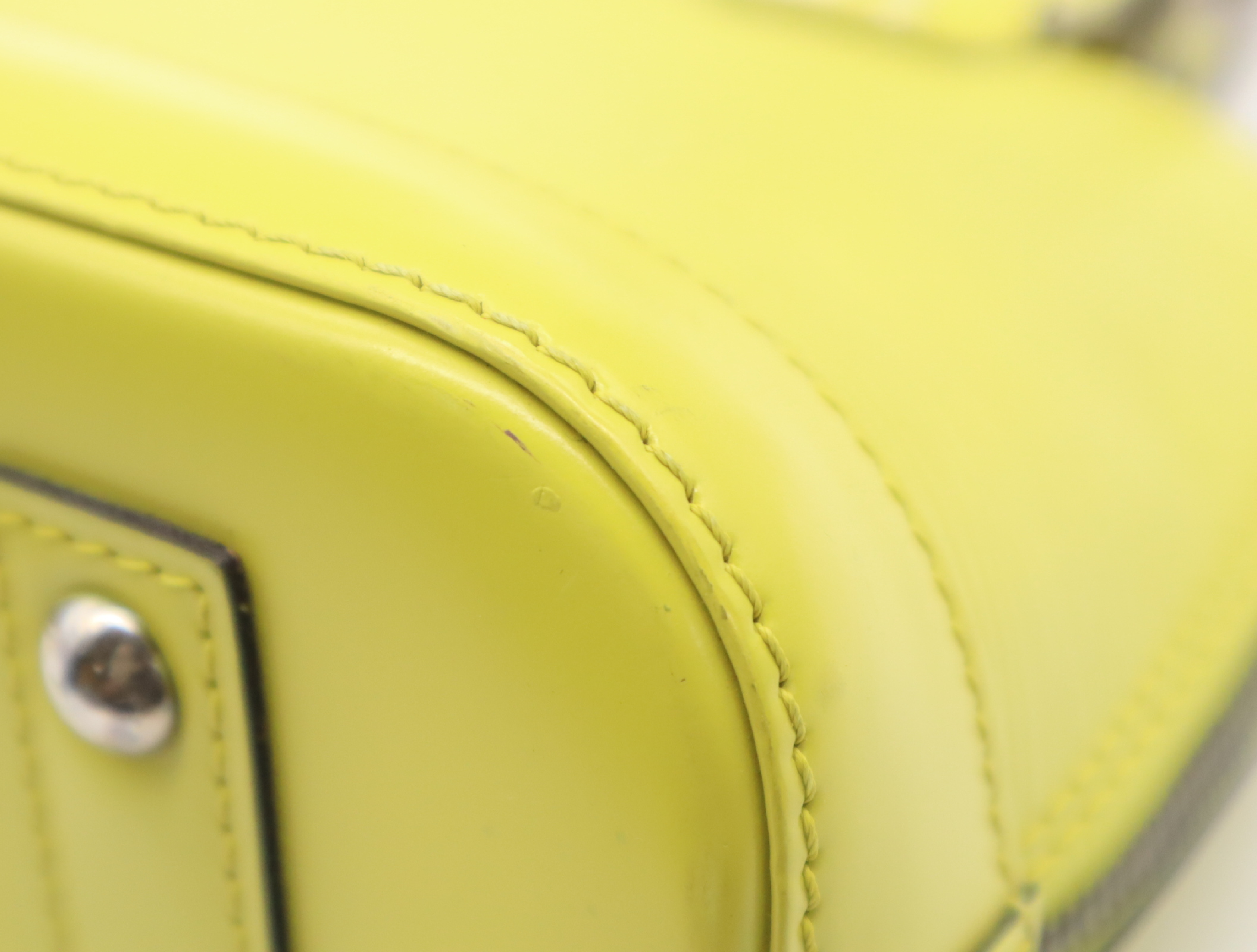 M40981 Epi Alma BB Pistache Handbag with Clochette, 2 Keys, and Shoulder Strap — view 7