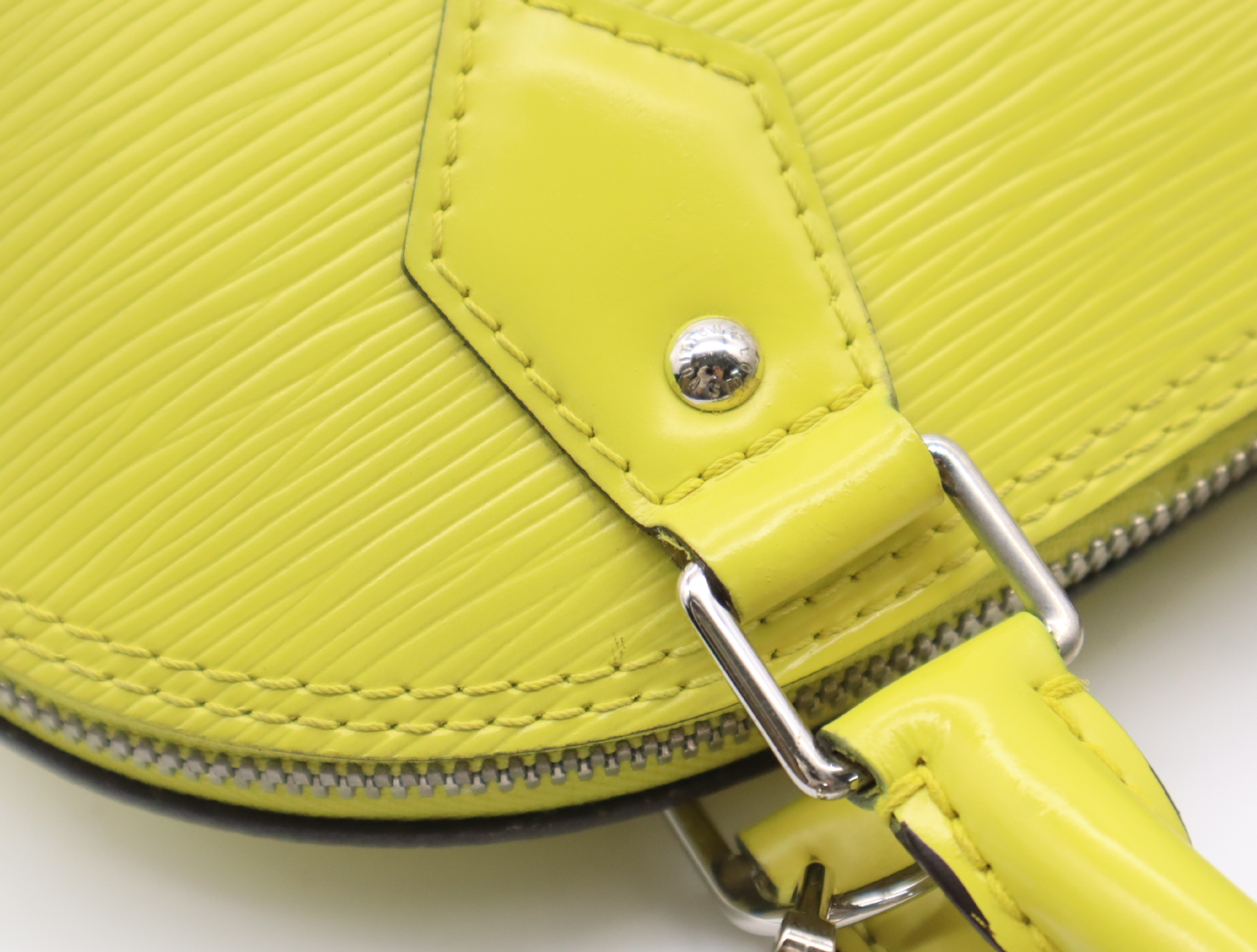 M40981 Epi Alma BB Pistache Handbag with Clochette, 2 Keys, and Shoulder Strap — view 8