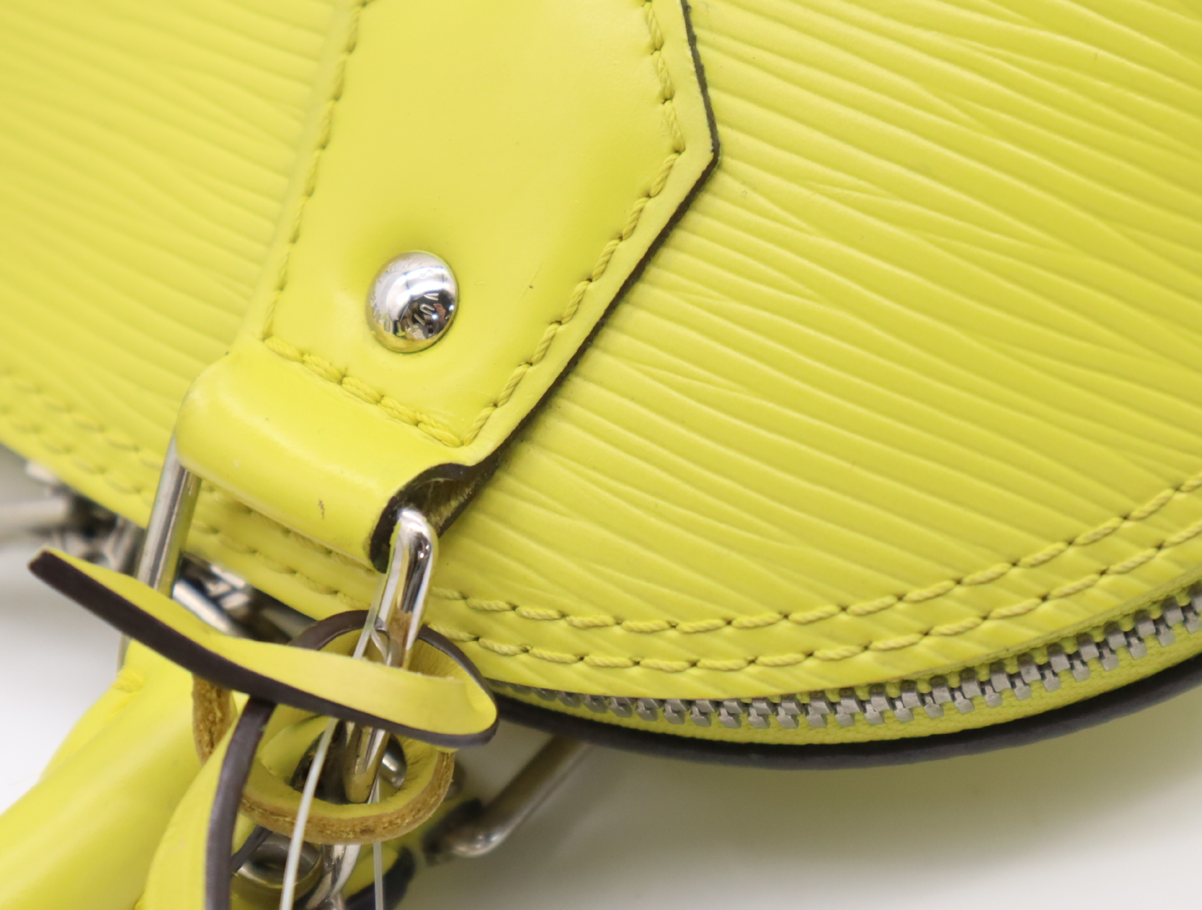 M40981 Epi Alma BB Pistache Handbag with Clochette, 2 Keys, and Shoulder Strap — view 9