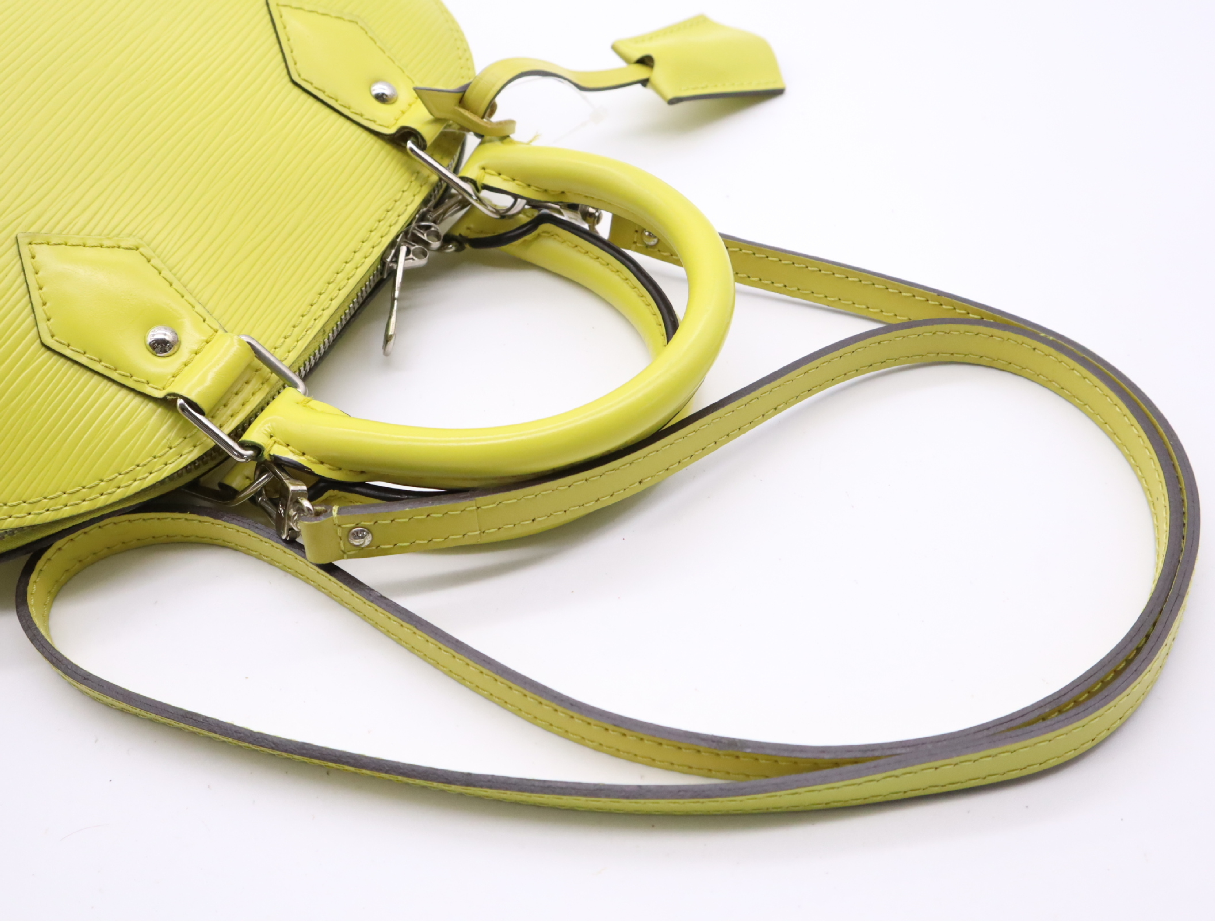 M40981 Epi Alma BB Pistache Handbag with Clochette, 2 Keys, and Shoulder Strap — view 10