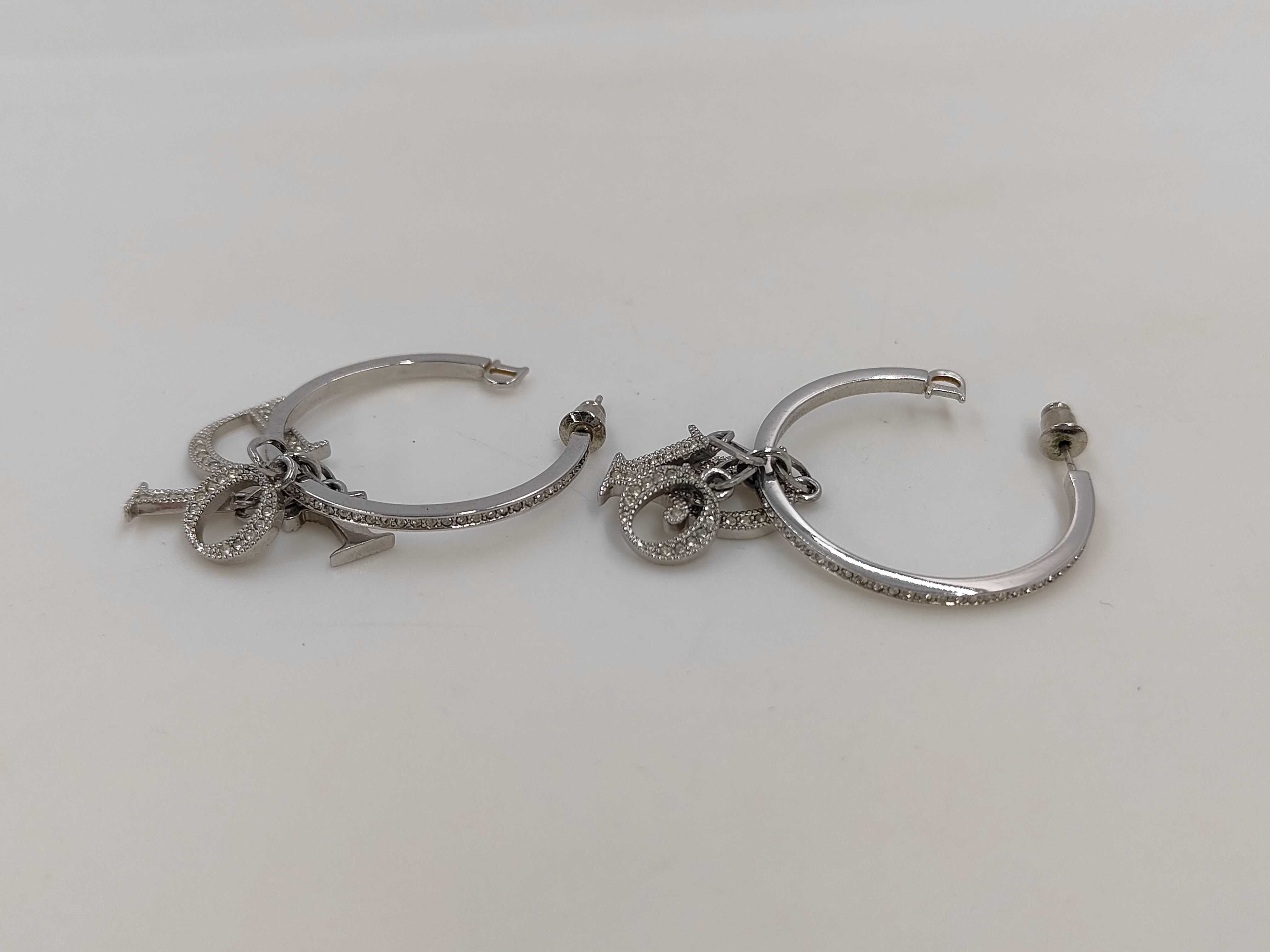 CD earrings vs. GP earrings — view 2