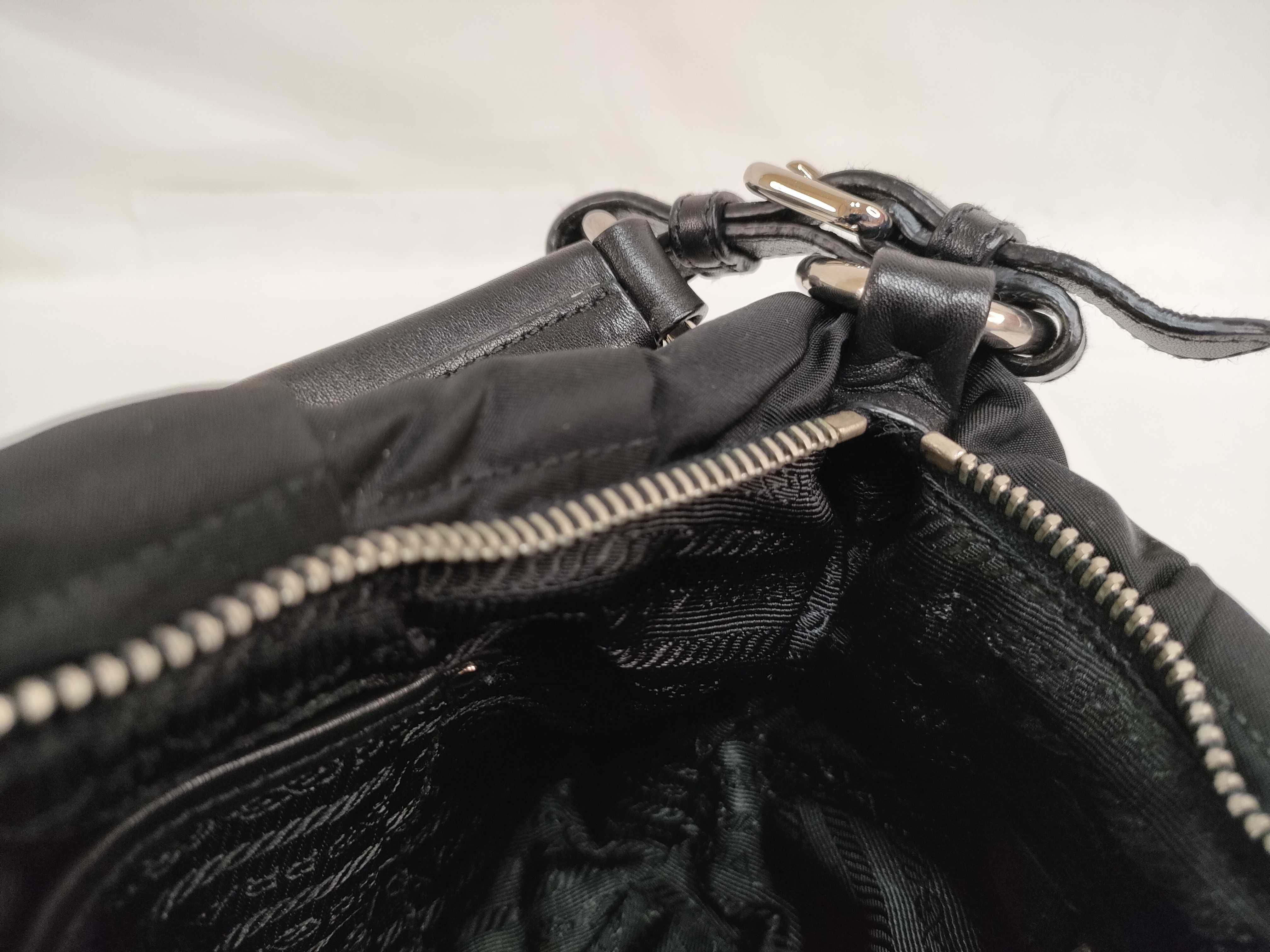 handbag with logo hardware, charm, dust bag, and shop card included. — view 12