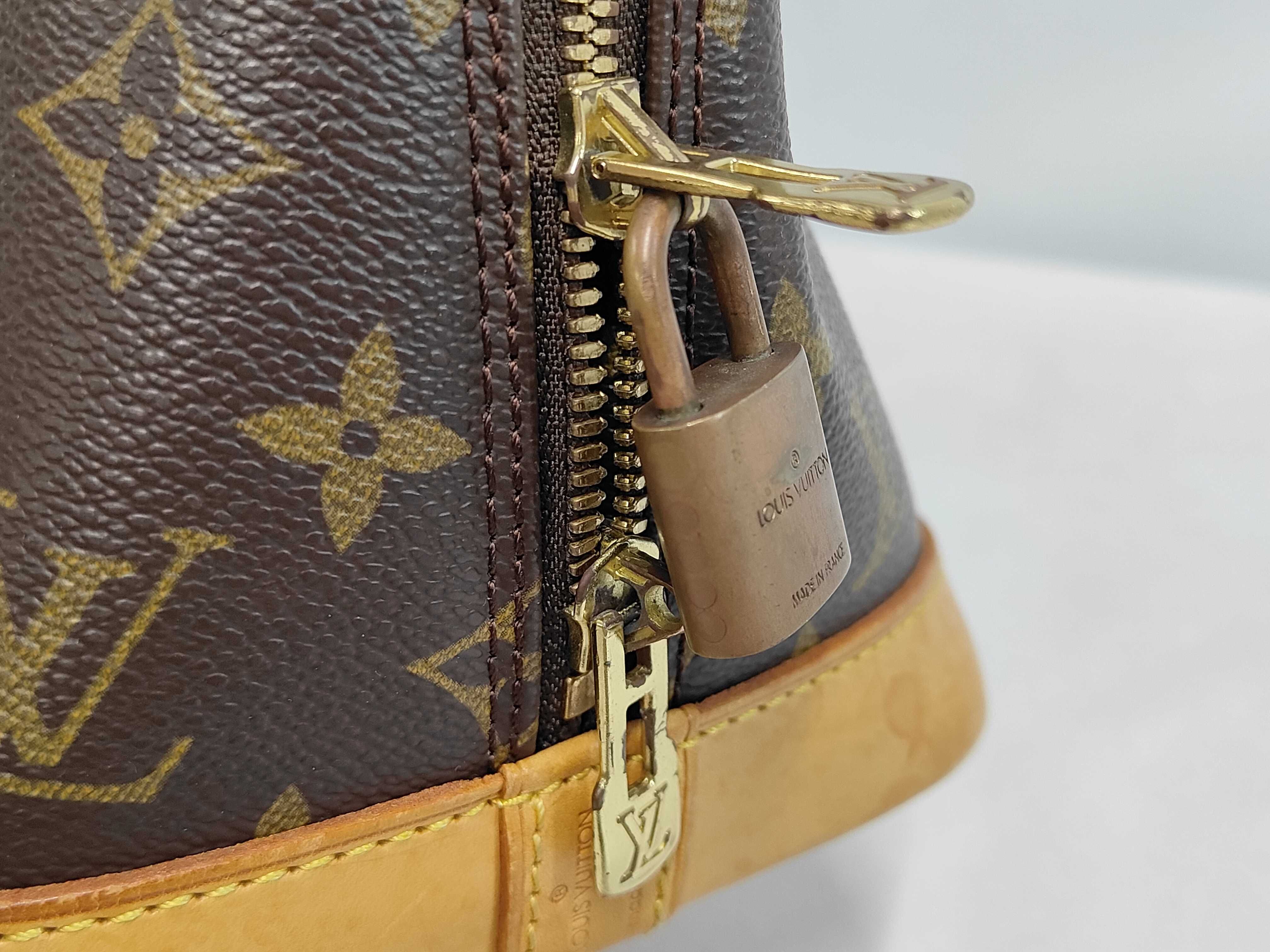 Monogram M40878 Alma MM Handbag — view 8