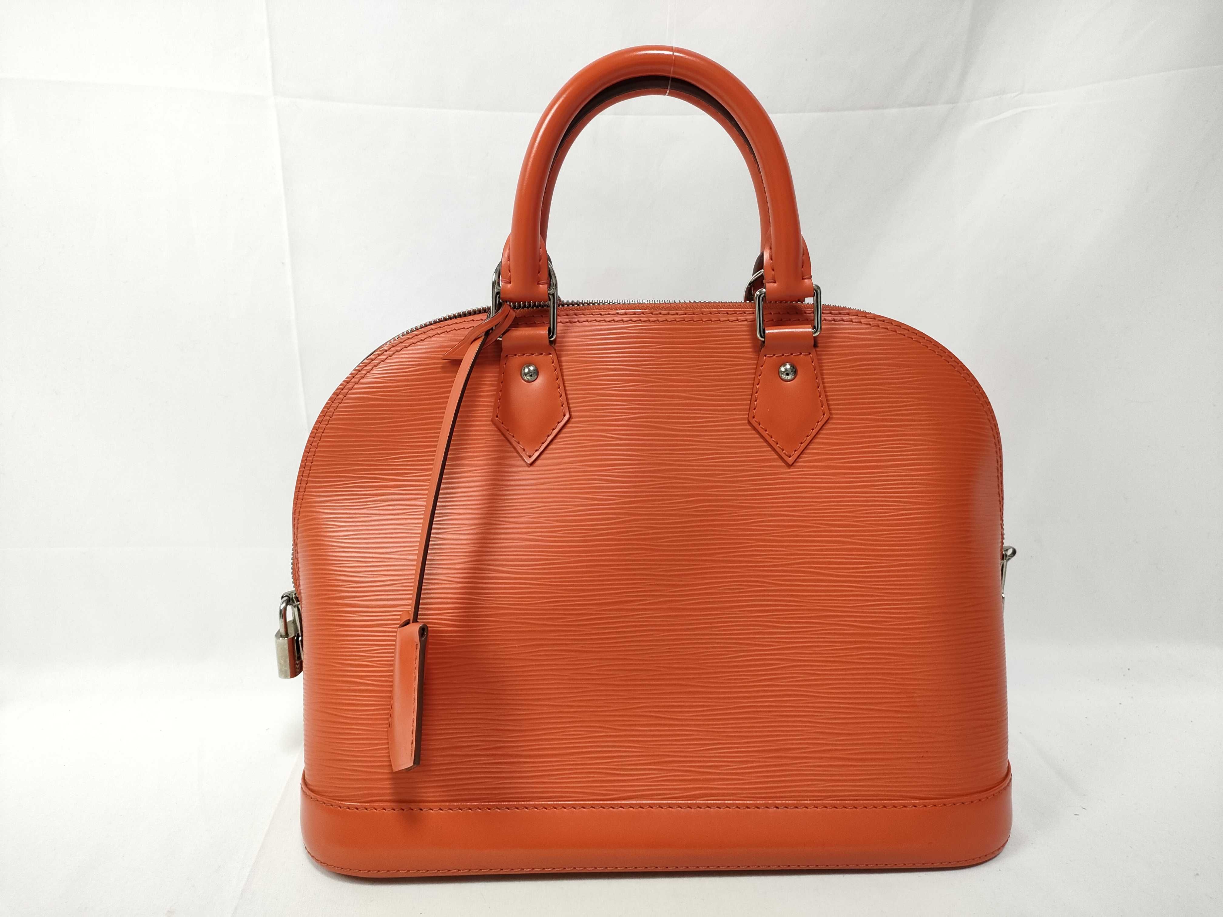 Epi Alma PM Handbag