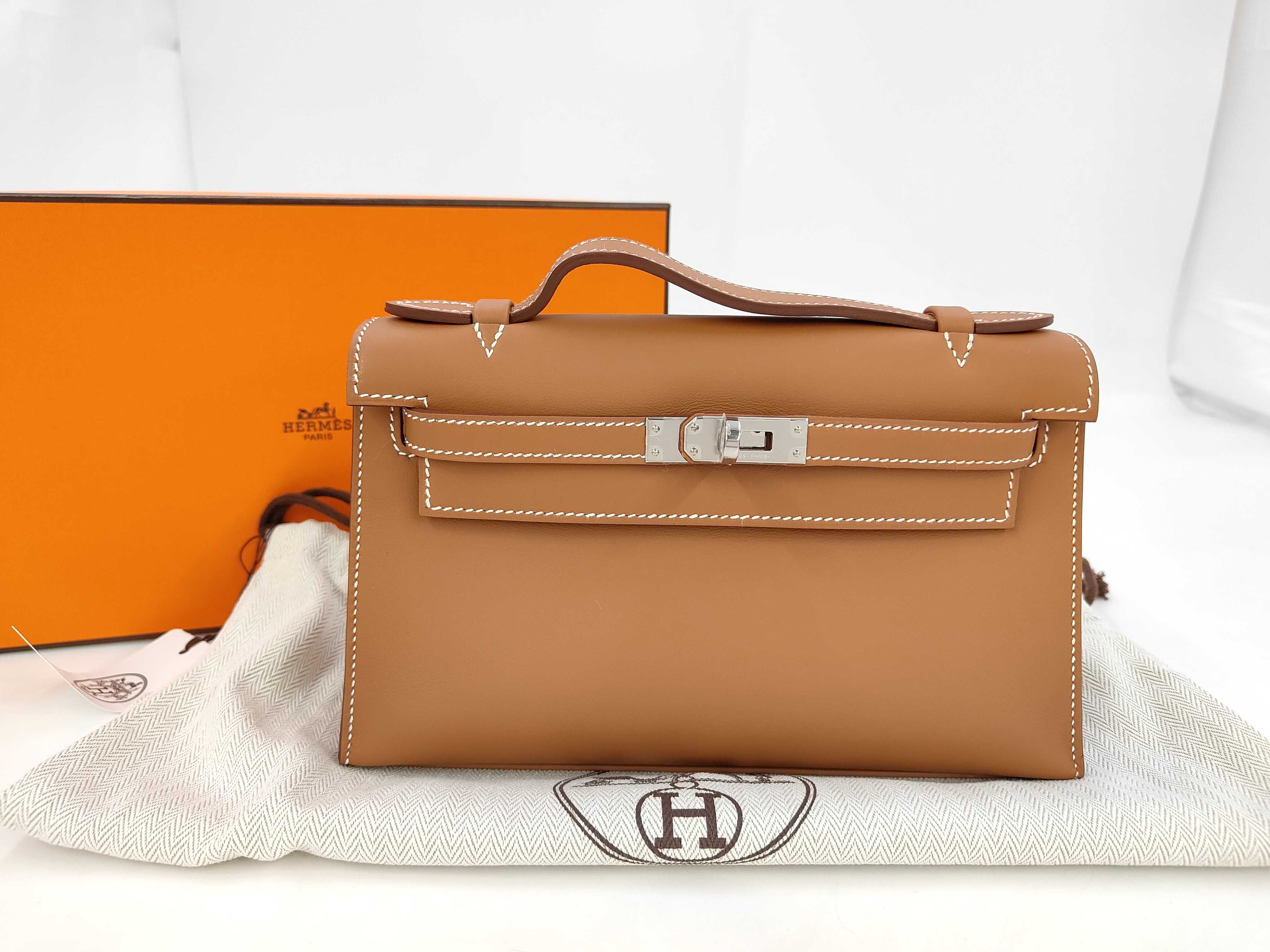 Pochette Kelly Gold Swift Leather Silver Hardware K Stamp Handbag