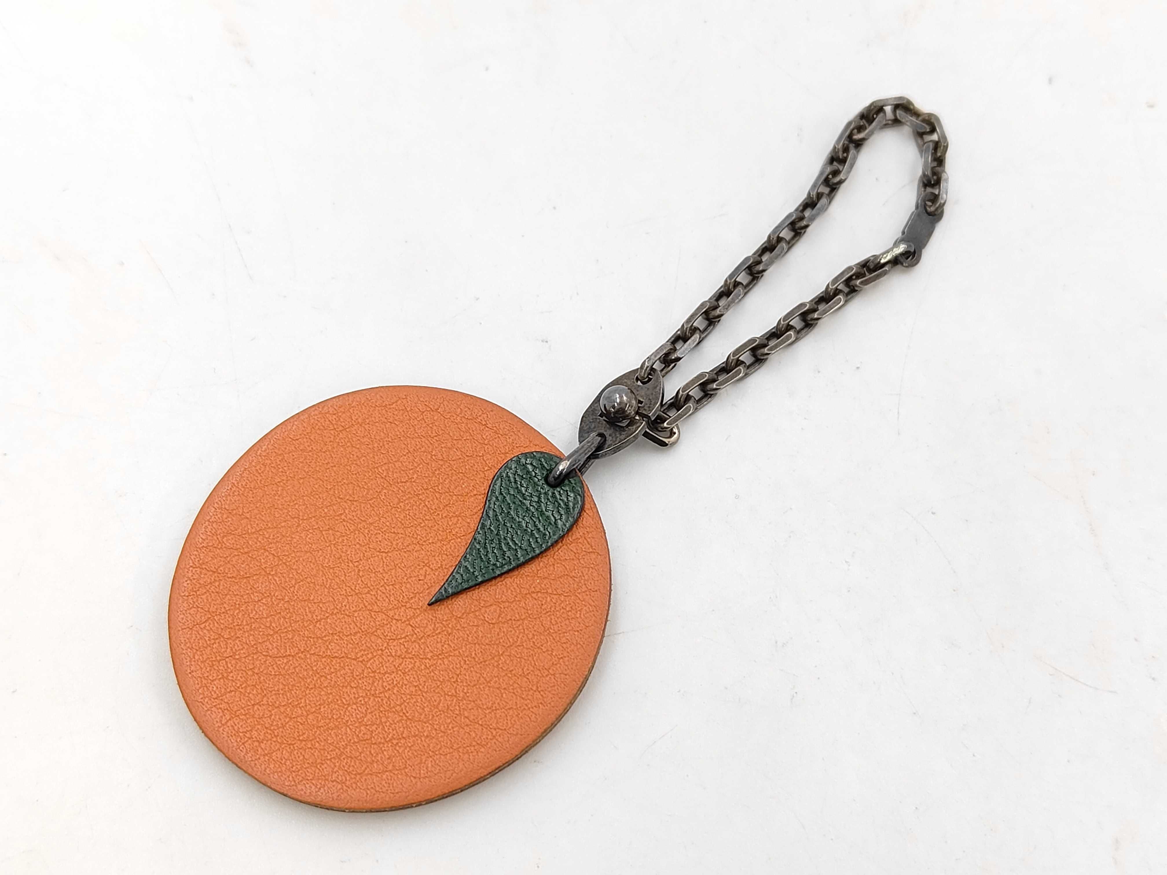 charm, orange charm