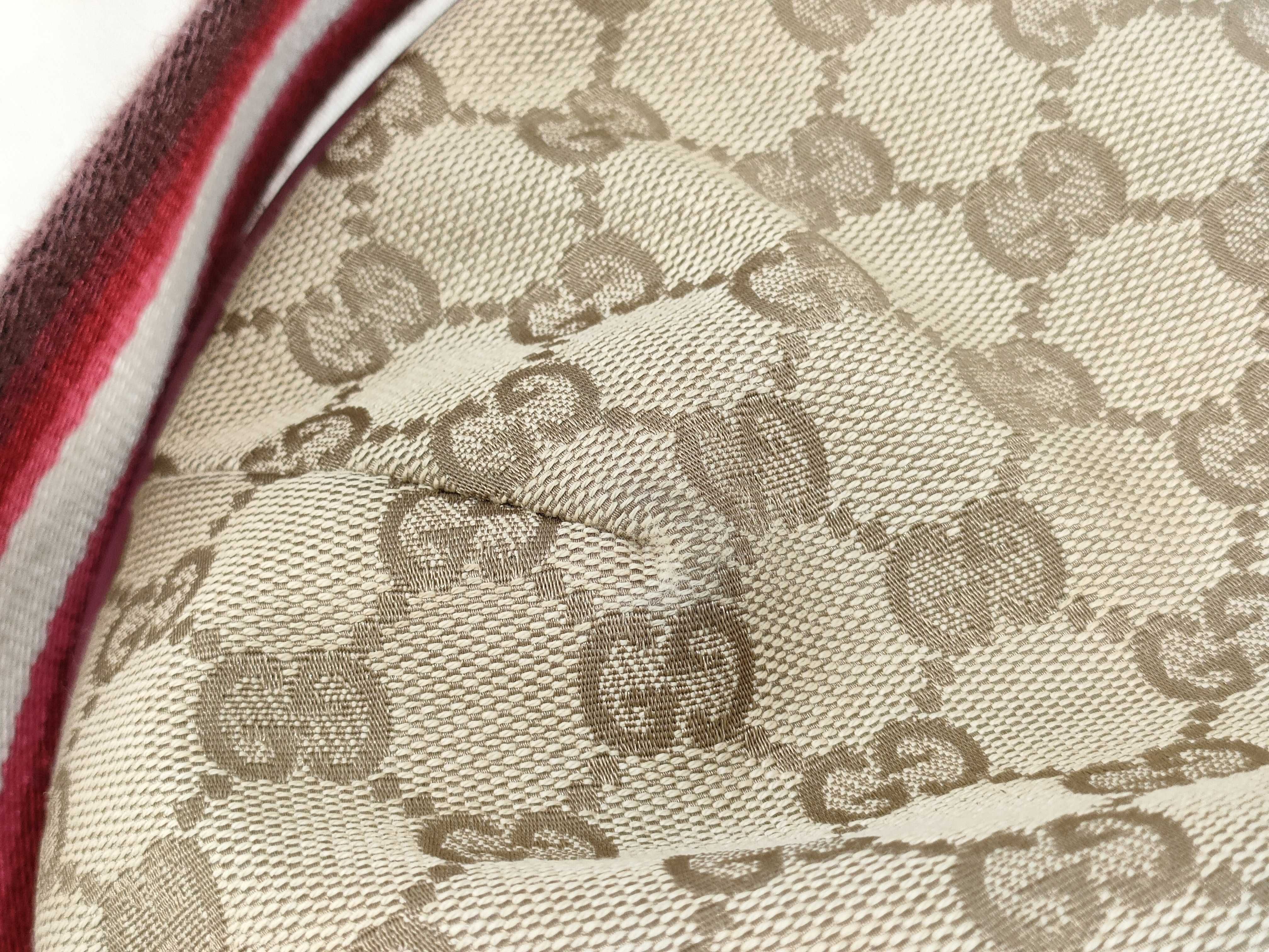GG Canvas Shoulder Bag with GG Pattern, Webbing Strap, and Leather Trim. — view 14