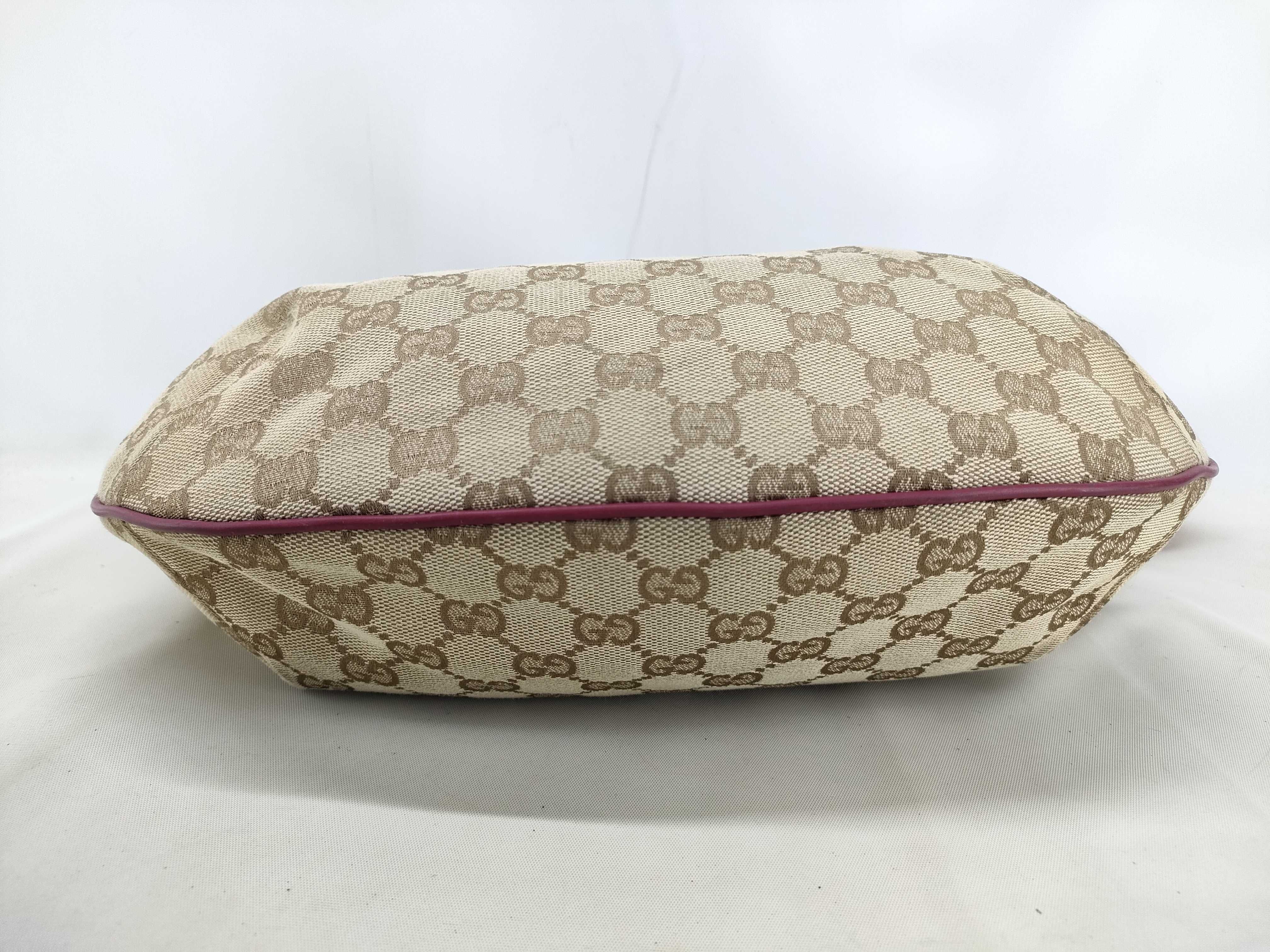 GG Canvas Shoulder Bag with GG Pattern, Webbing Strap, and Leather Trim. — view 3