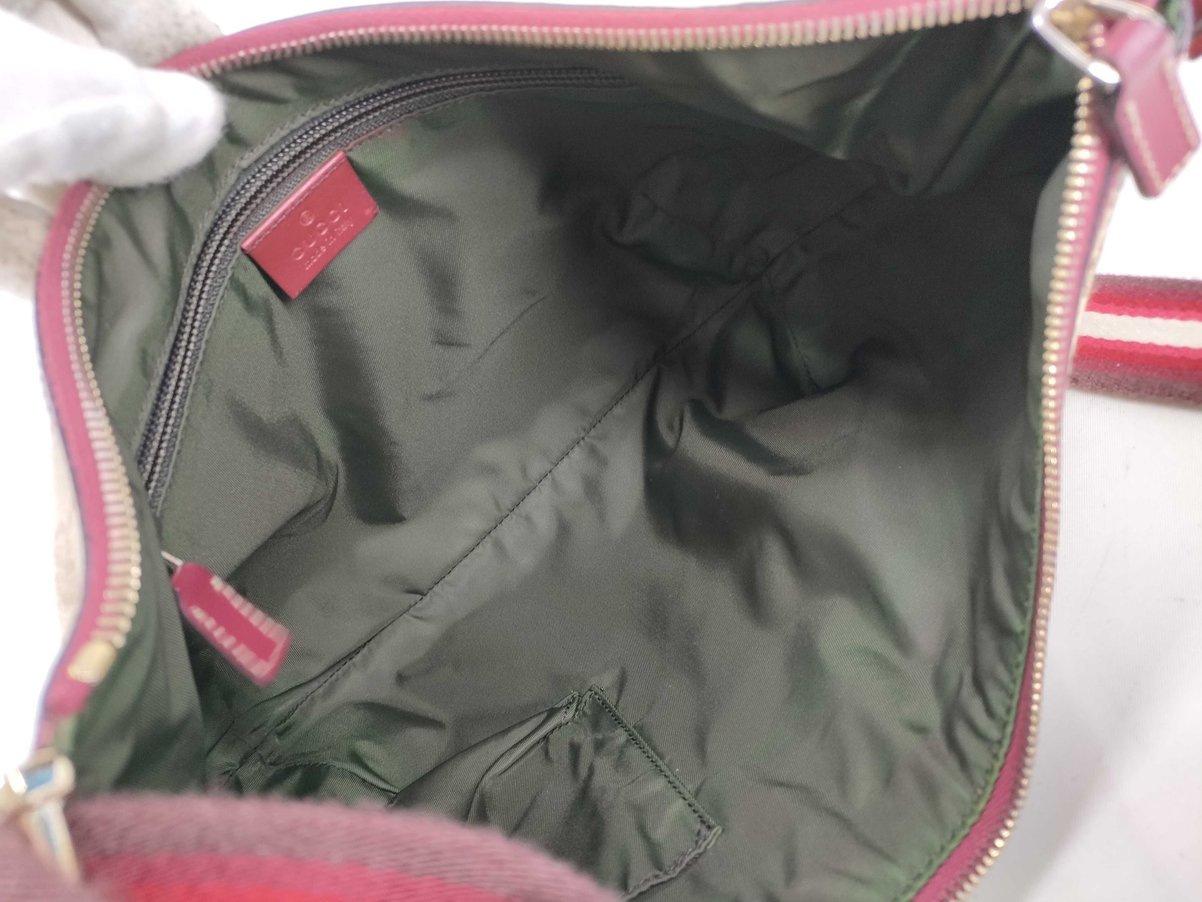 GG Canvas Shoulder Bag with GG Pattern, Webbing Strap, and Leather Trim. — view 9