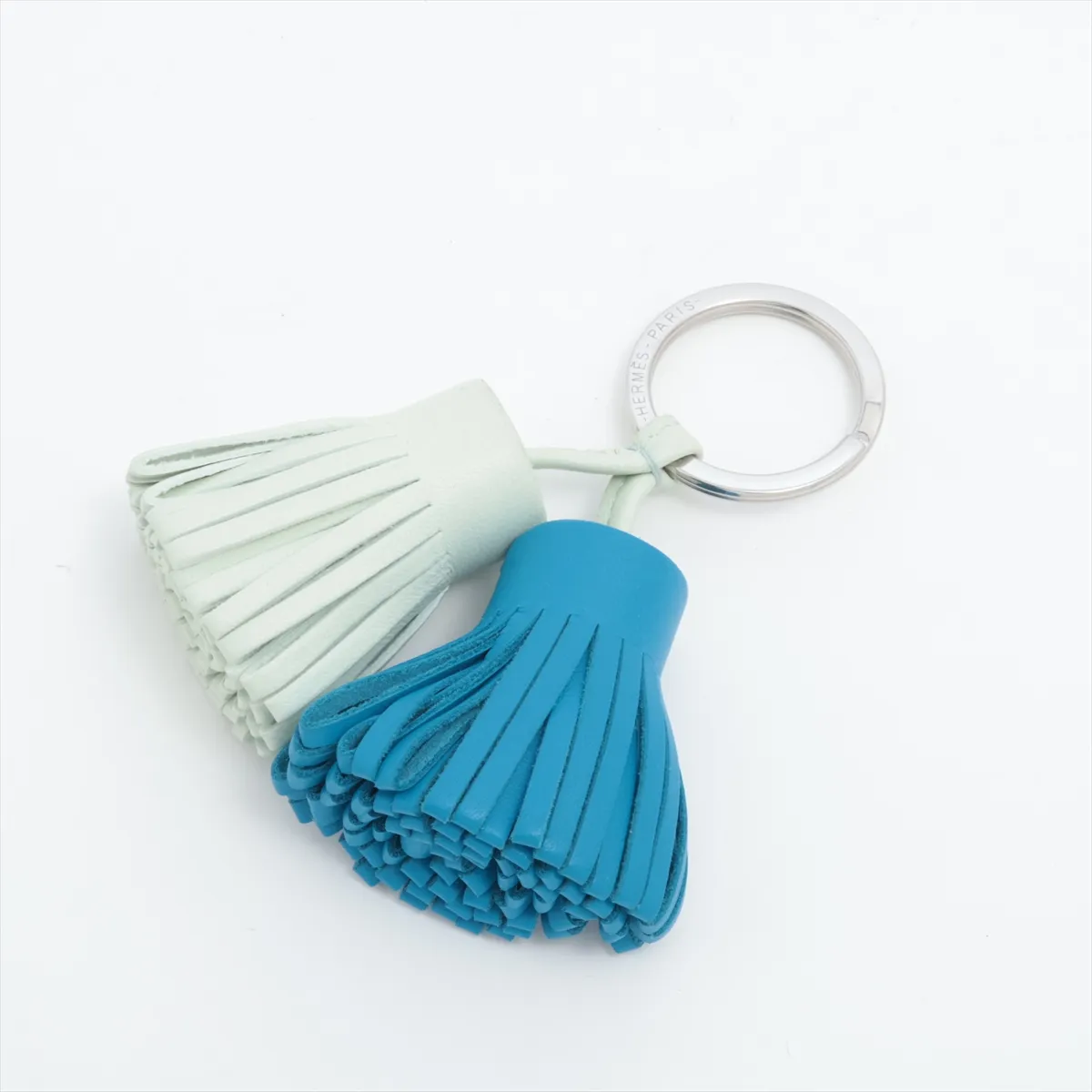 Carmen Unodos Charm, Agneau Milo Blue x Green, slightly misshapen, worn, and wrinkled.