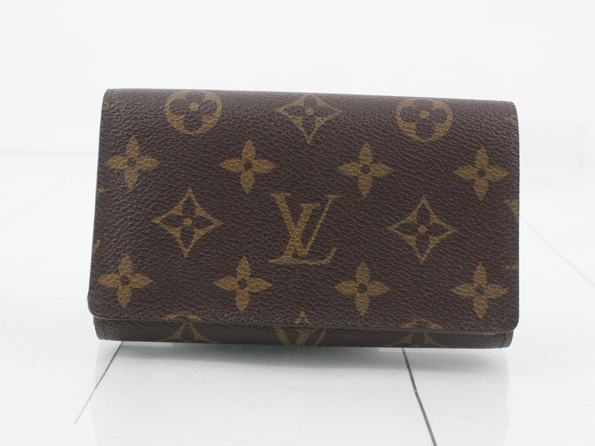 Portefeuille Trésor Monogram M61730, with box and dust bag.