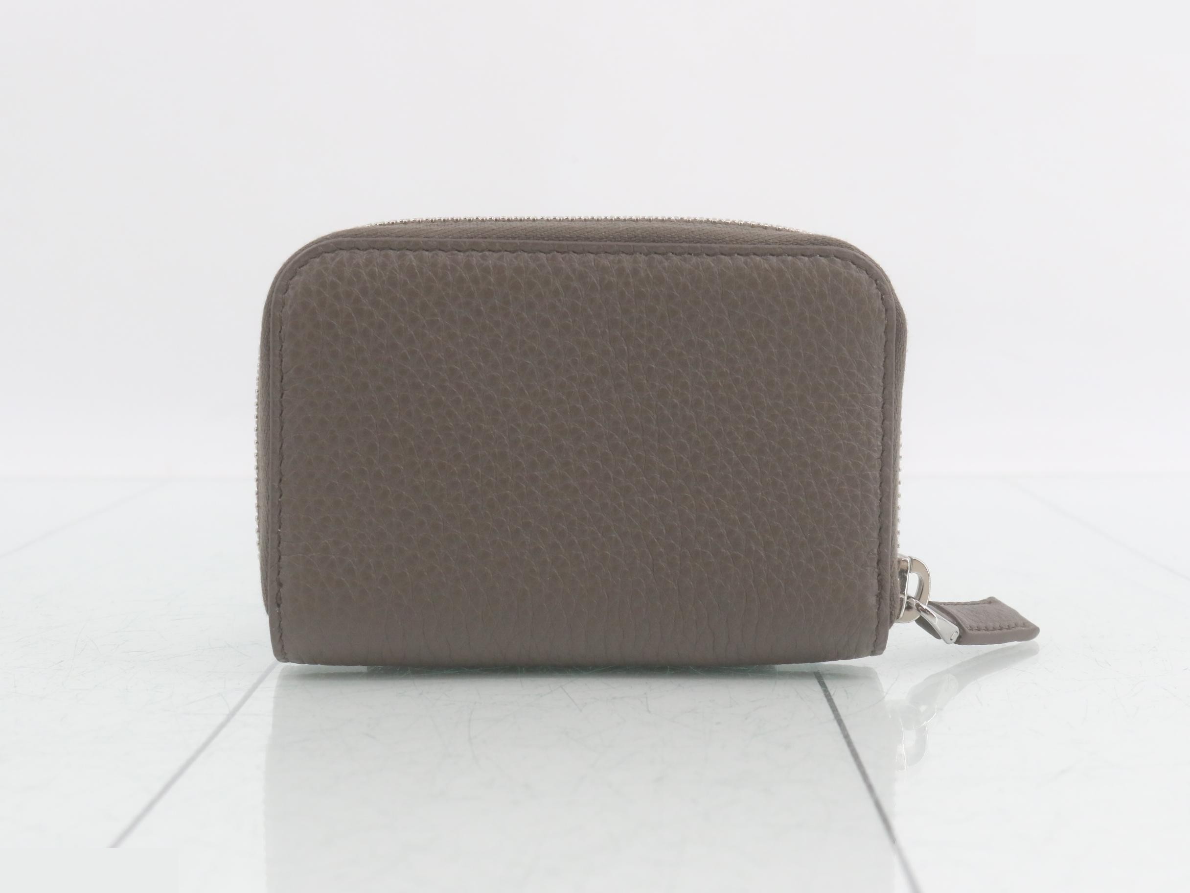Round zipper coin case, unused. — view 2