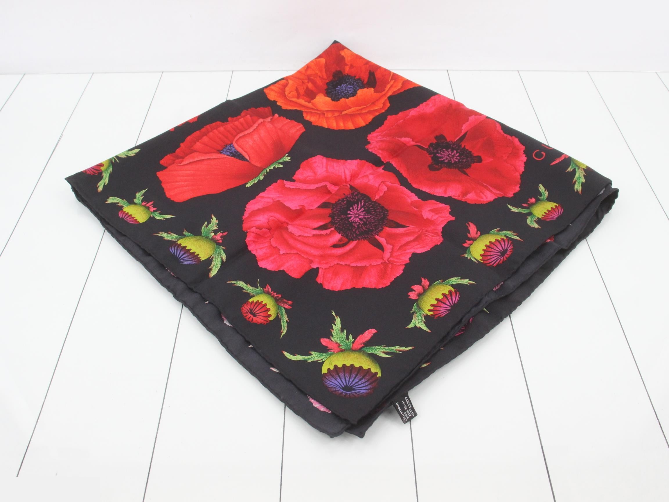 Silk scarf, black x multi-color floral pattern.